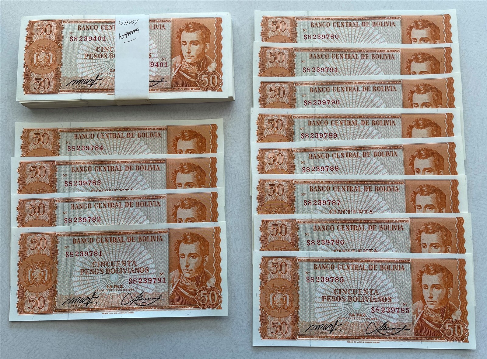 Bolivia 1962 50 Pesos Bank bundle of 100 CU+12 singles. P 162 BL0086 combine shi Bolivia 1962 50 Pesos Bank bundle of 100 CU+12 singles. P 162 BL0086 combine shi