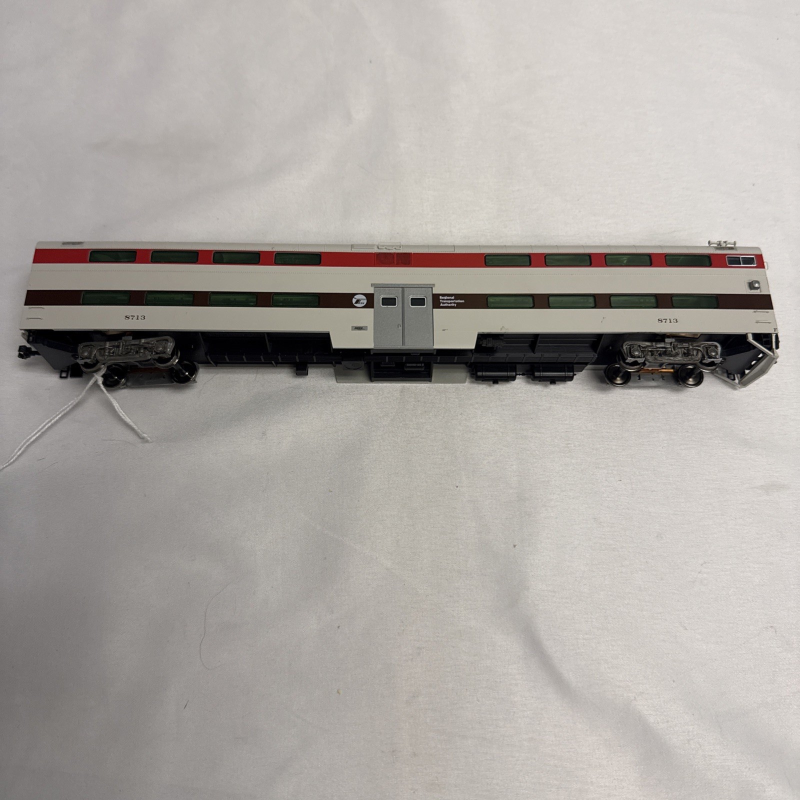 Regional Transportation Authority Rd# 8713 Kato HO Scale Bi-Level Cab Coach (NB) Regional Transportation Authority Rd# 8713 Kato HO Scale Bi-Level Cab Coach (NB)