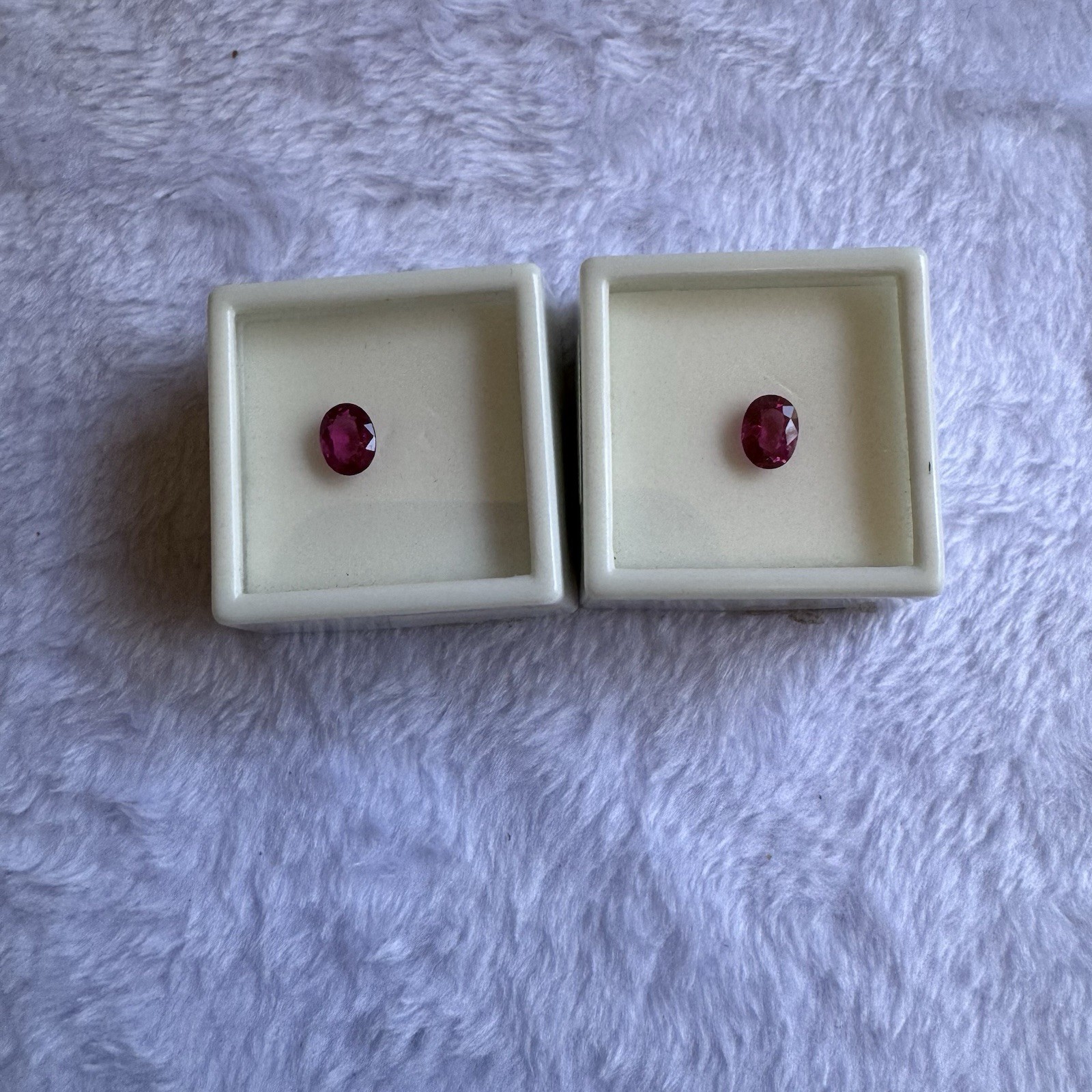 Set of 2 oval, pink tourmaline cut & faceted stones. Each stone weighs .85CT