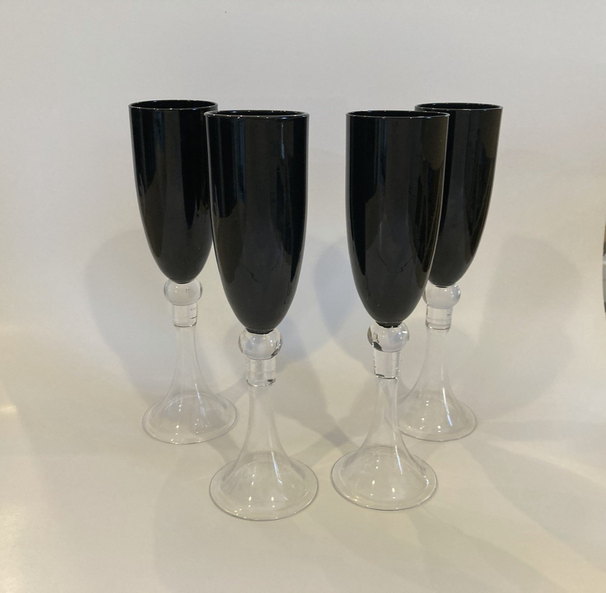 (4) Pier 1 Dante Black Champagne Flutes With Clear Hollow Stem (4) Pier 1 Dante Black Champagne Flutes With Clear Hollow Stem