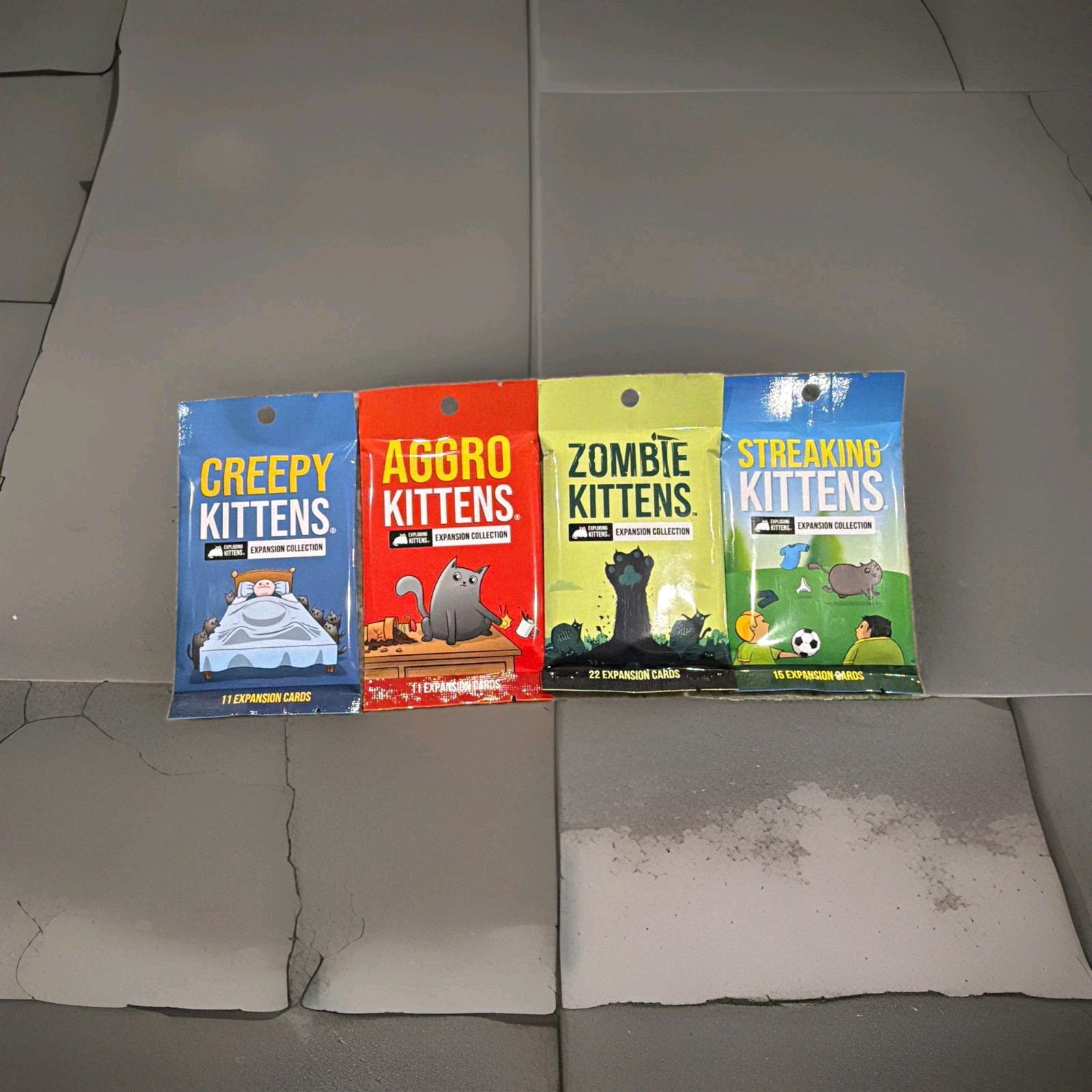 Exploding Kittens Expansions: Creepy, Aggro, Zombie & Streaking Kittens Exploding Kittens Expansions: Creepy, Aggro, Zombie & Streaking Kittens