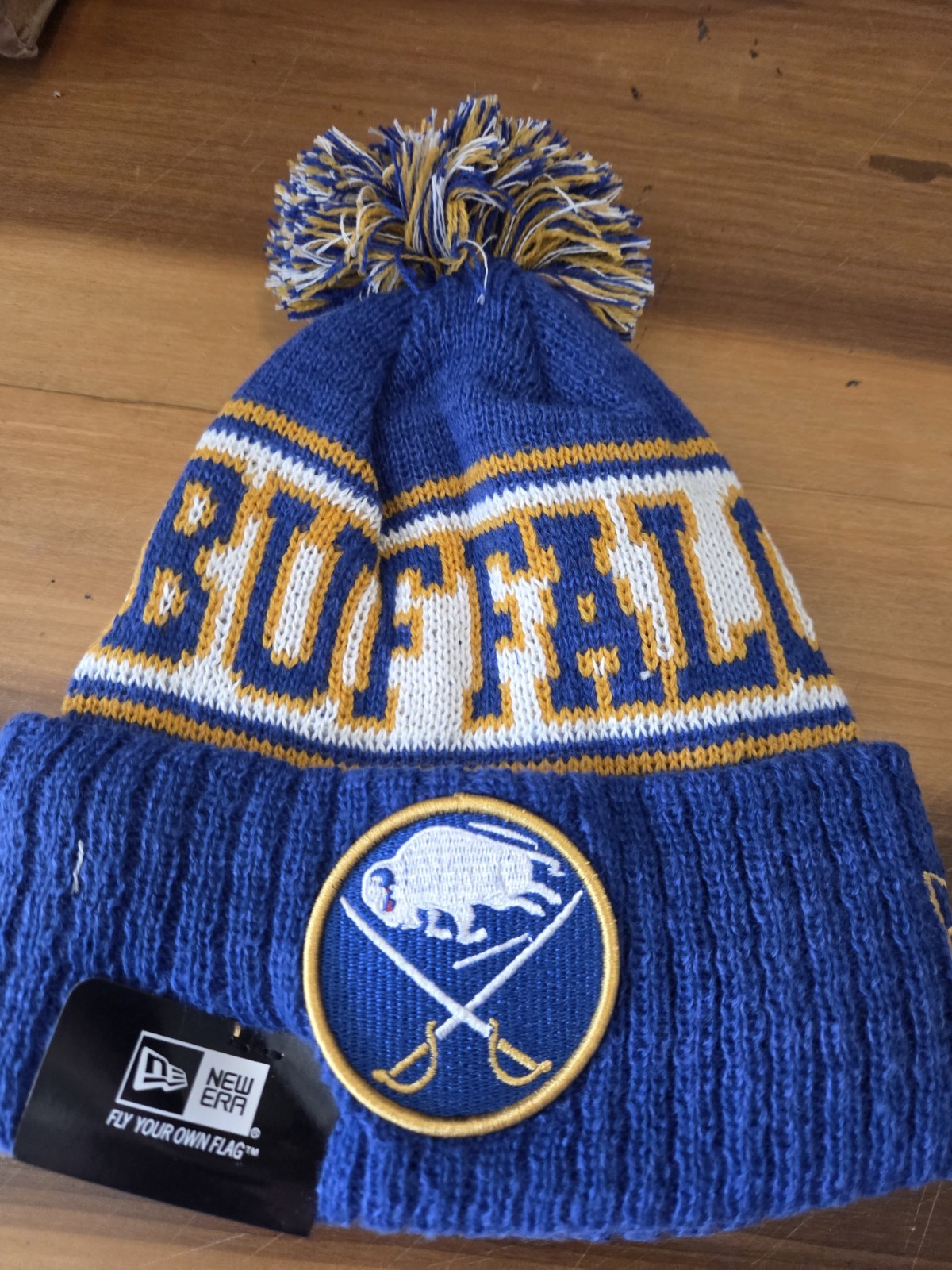 BUFFALO SABRES NHL NEW ERA BLUE & GOLD KNIT BEANIE. NEW