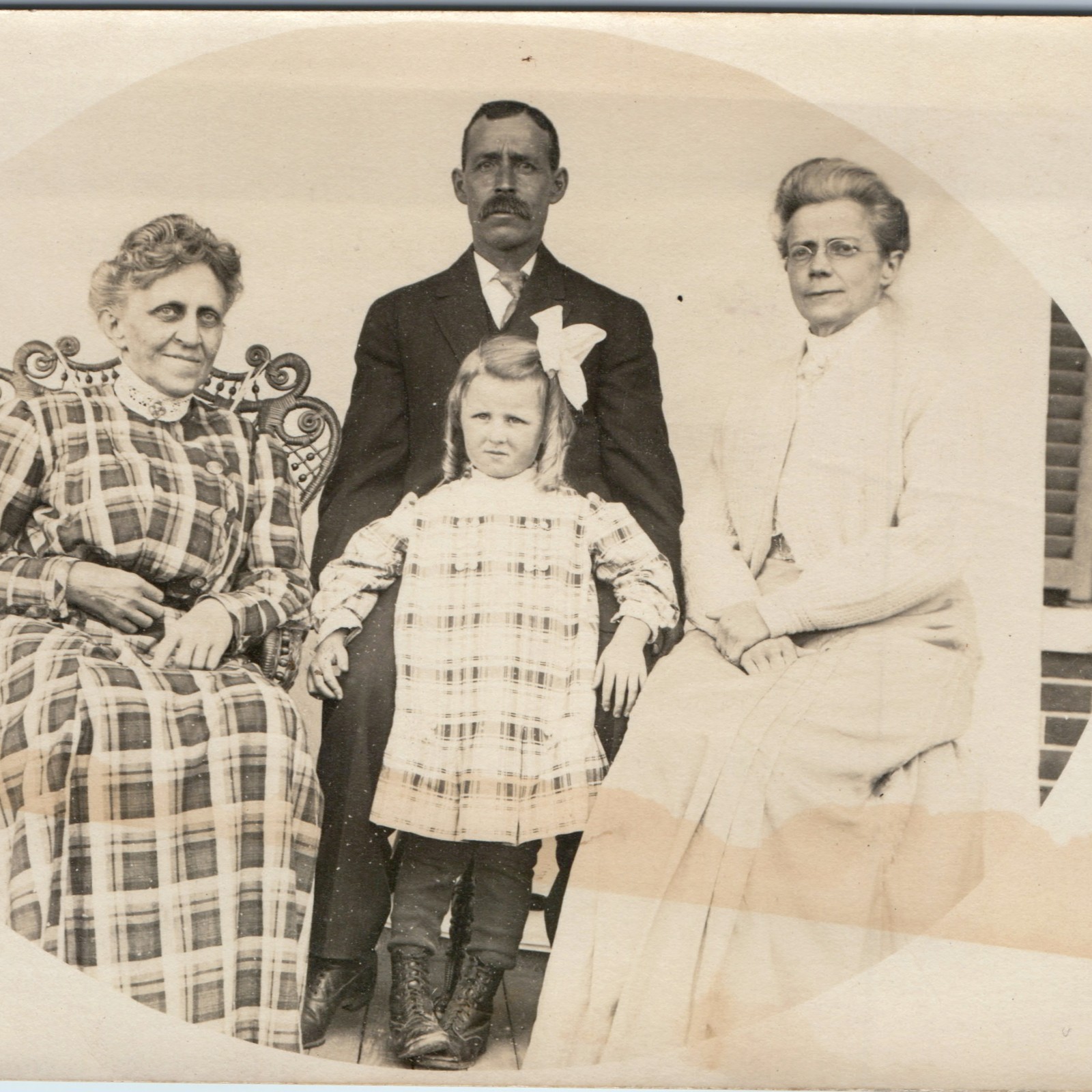 c1910s Family Porch Portrait RPPC Plaid Dress Wicker Chair Eyeglasses Postcard c1910s Family Porch Portrait RPPC Plaid Dress Wicker Chair Eyeglasses Postcard