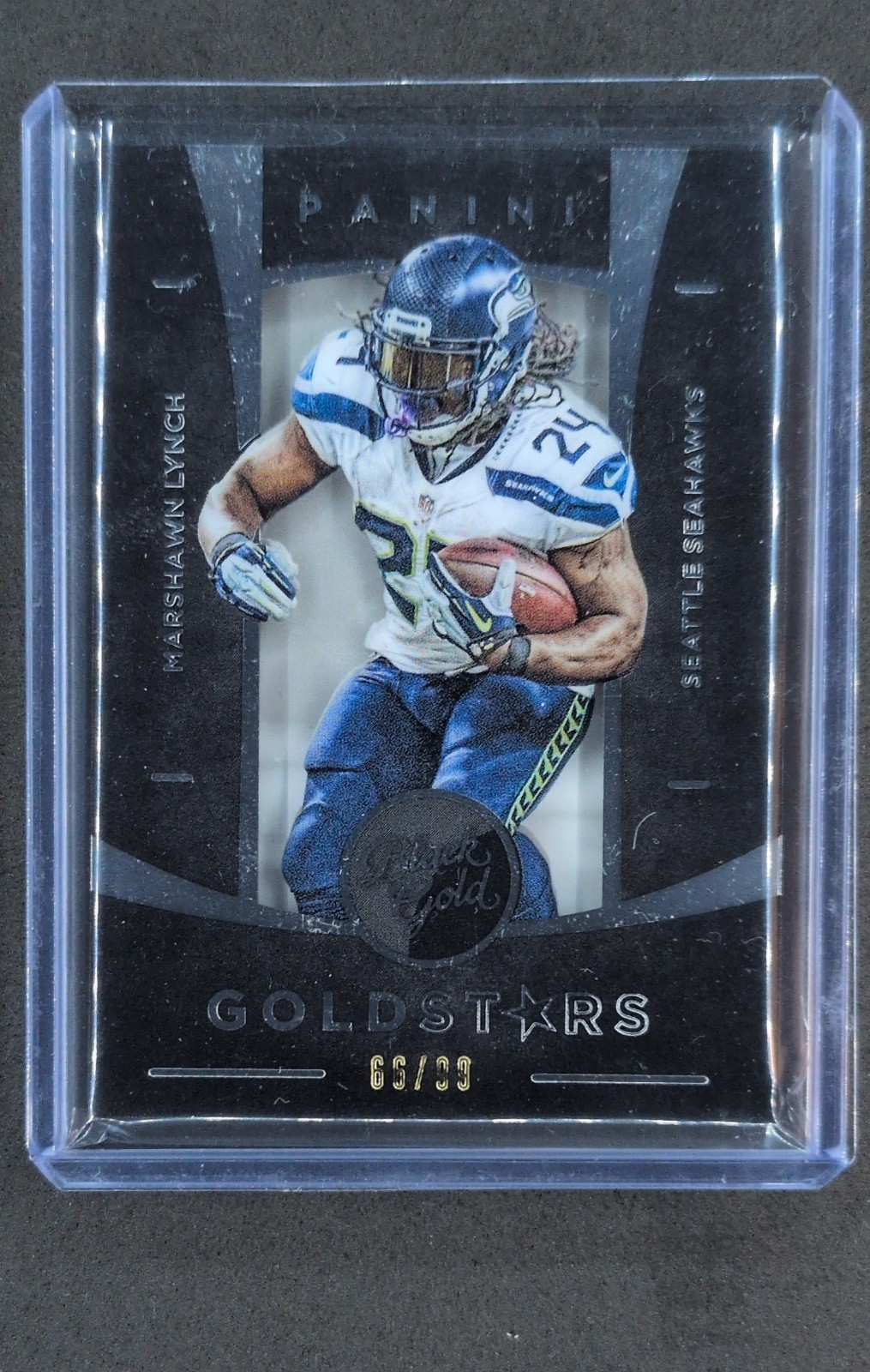 2015 Panini Black Gold - Gold Stars Marshawn Lynch #GOS-7 White Gold /99