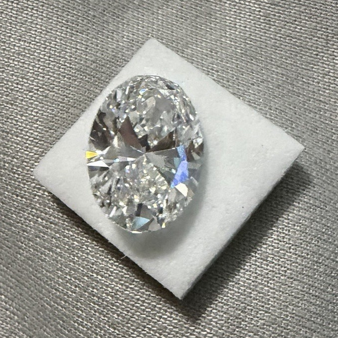 IGI 5.00ct Lab Grown Oval Cut Diamond E SI1 13.89x9.70x5.91mm $6395 MSRP IGI 5.00ct Lab Grown Oval Cut Diamond E SI1 13.89x9.70x5.91mm $6395 MSRP