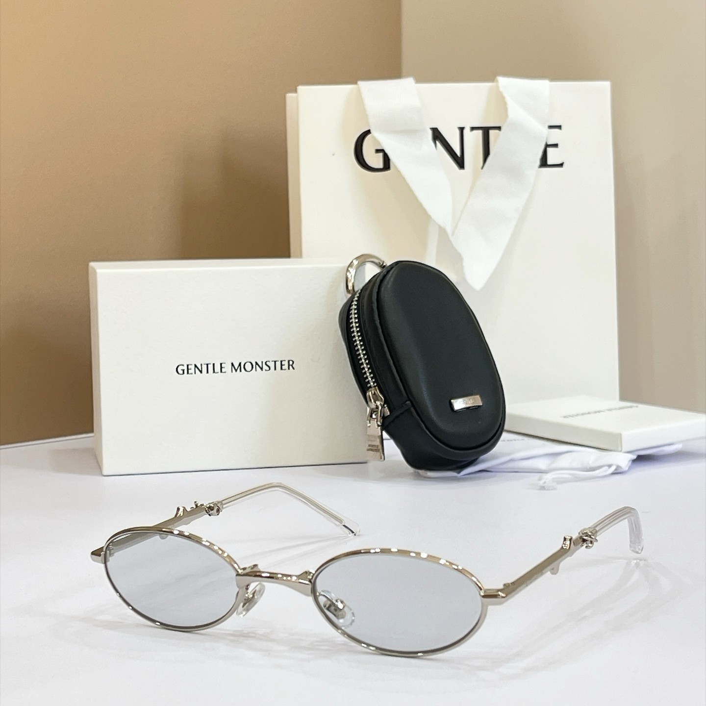 Gentle Monster RADI Mini Folding Oval Sunglasses Silver Light Grey Lens 54MM