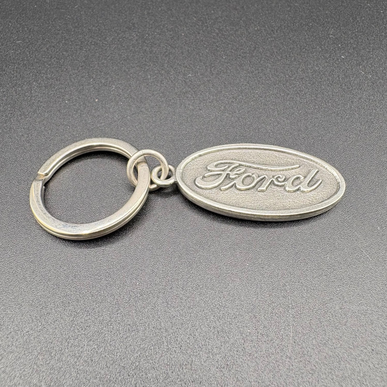 Vintage Ford Oval Logo Keychain Pewter Metal Used Auto Collectible Vintage Ford Oval Logo Keychain Pewter Metal Used Auto Collectible
