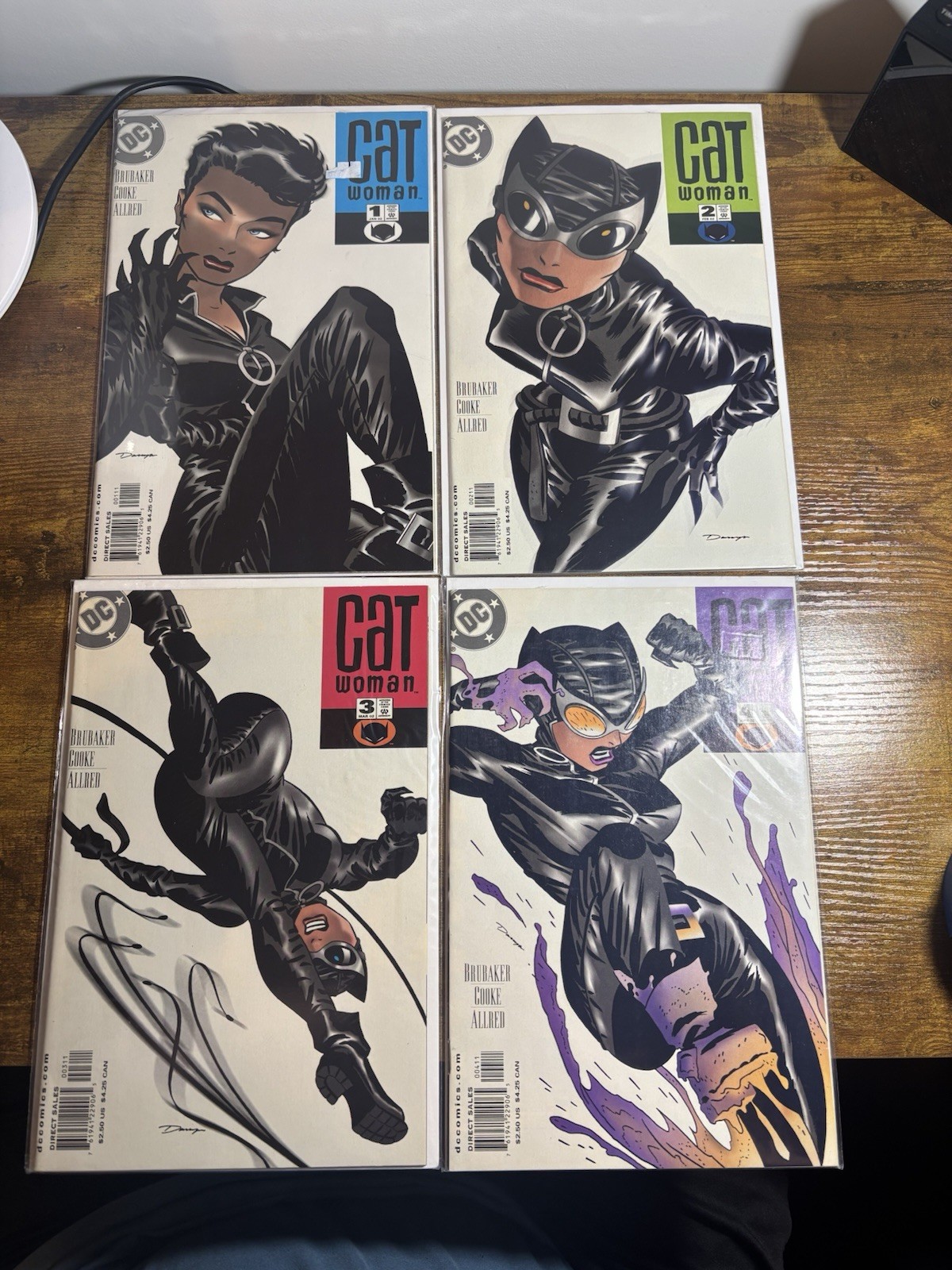 DC Comics Catwoman 1-4 (2002) 4 Issue Comic Lot Ed Brubaker Darwyn Cooke (VF/NM) DC Comics Catwoman 1-4 (2002) 4 Issue Comic Lot Ed Brubaker Darwyn Cooke (VF/NM)