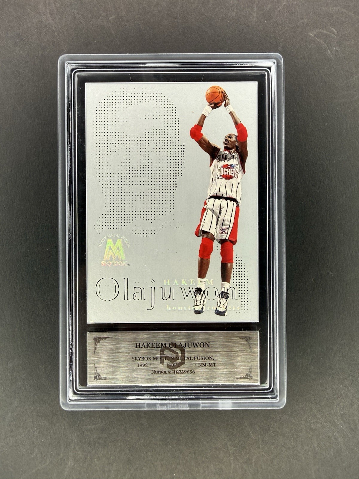 1998-99 SkyBox Molten Metal Fusion Hakeem Olajuwon Heavy Metal Fusion PCG 8 1998-99 SkyBox Molten Metal Fusion Hakeem Olajuwon Heavy Metal Fusion PCG 8