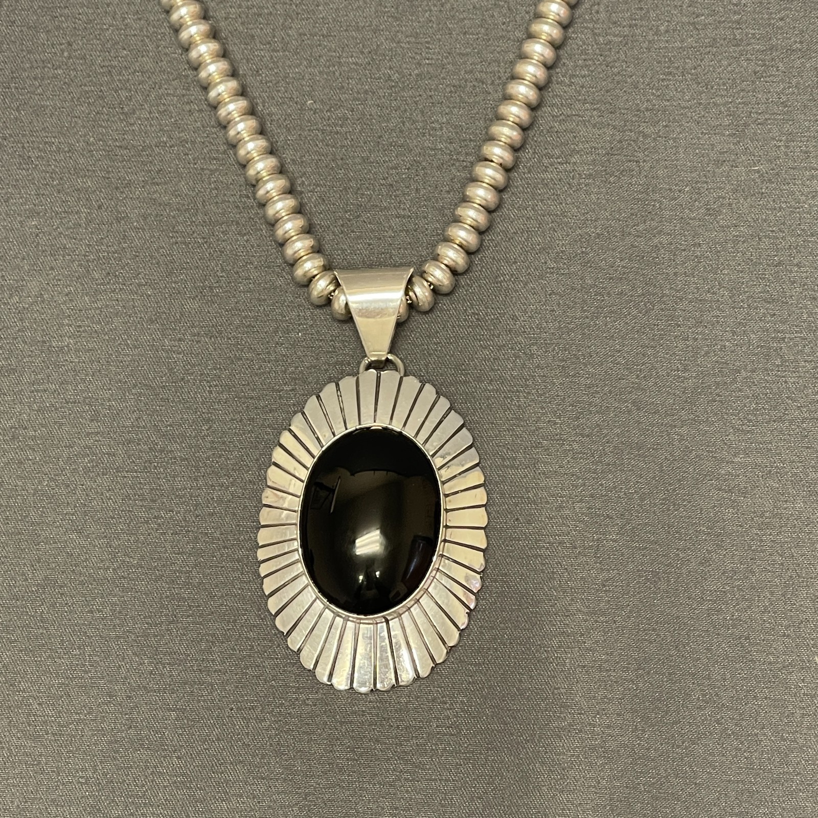 Suzie James, Navajo Sterling Silver and Onyx Pendant on Silver Beaded Necklace