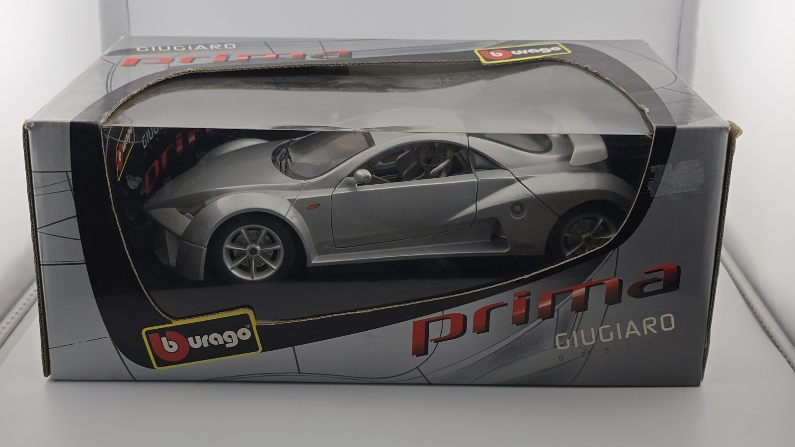 Burago 1/18 Prima Giugiaro Silver In Box Diecast Model Car Burago 1/18 Prima Giugiaro Silver In Box Diecast Model Car
