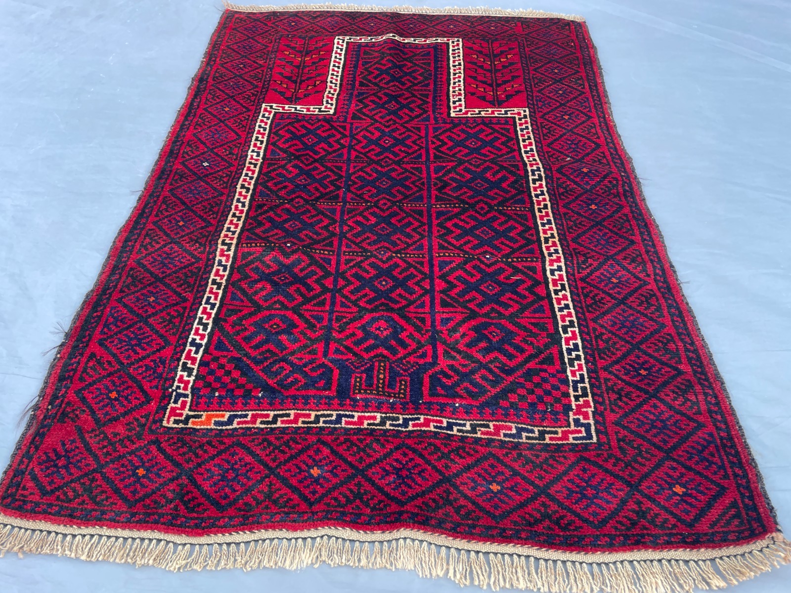 2x4 Vintage Afghan Baluchi Wool Rug with Repeating Geometric Gul Motifs
