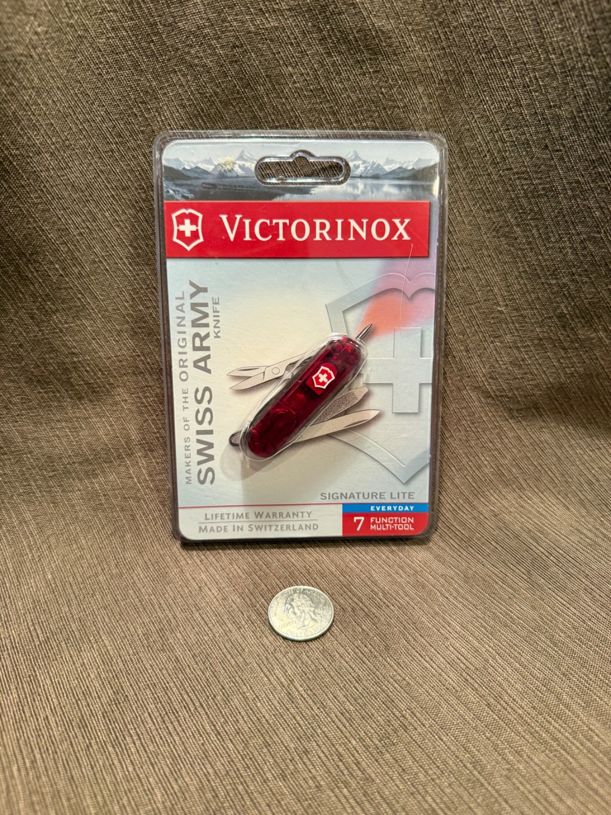 Victorinox Swiss Army Knife; SIGNATURE LITE model Translucent RED 58mm Victorinox Swiss Army Knife; SIGNATURE LITE model Translucent RED 58mm