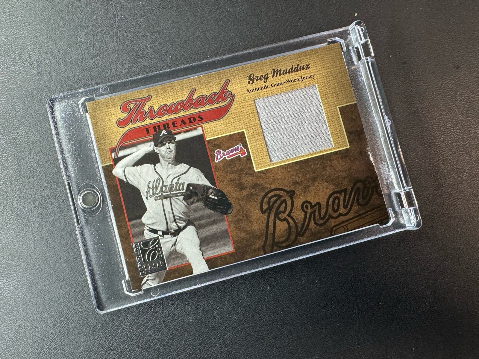 2005 Donruss Elite - Throwback Threads Greg Maddux #TT-16 /150 (MEM)
