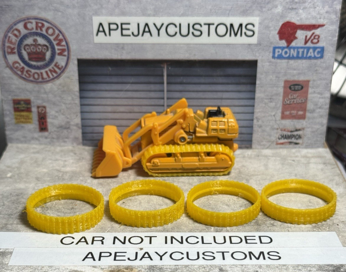 2 pair of new tracks for Tomica No. 106 S-1/87 Komatsu D65s Bulldozer 2 pair of new tracks for Tomica No. 106 S-1/87 Komatsu D65s Bulldozer