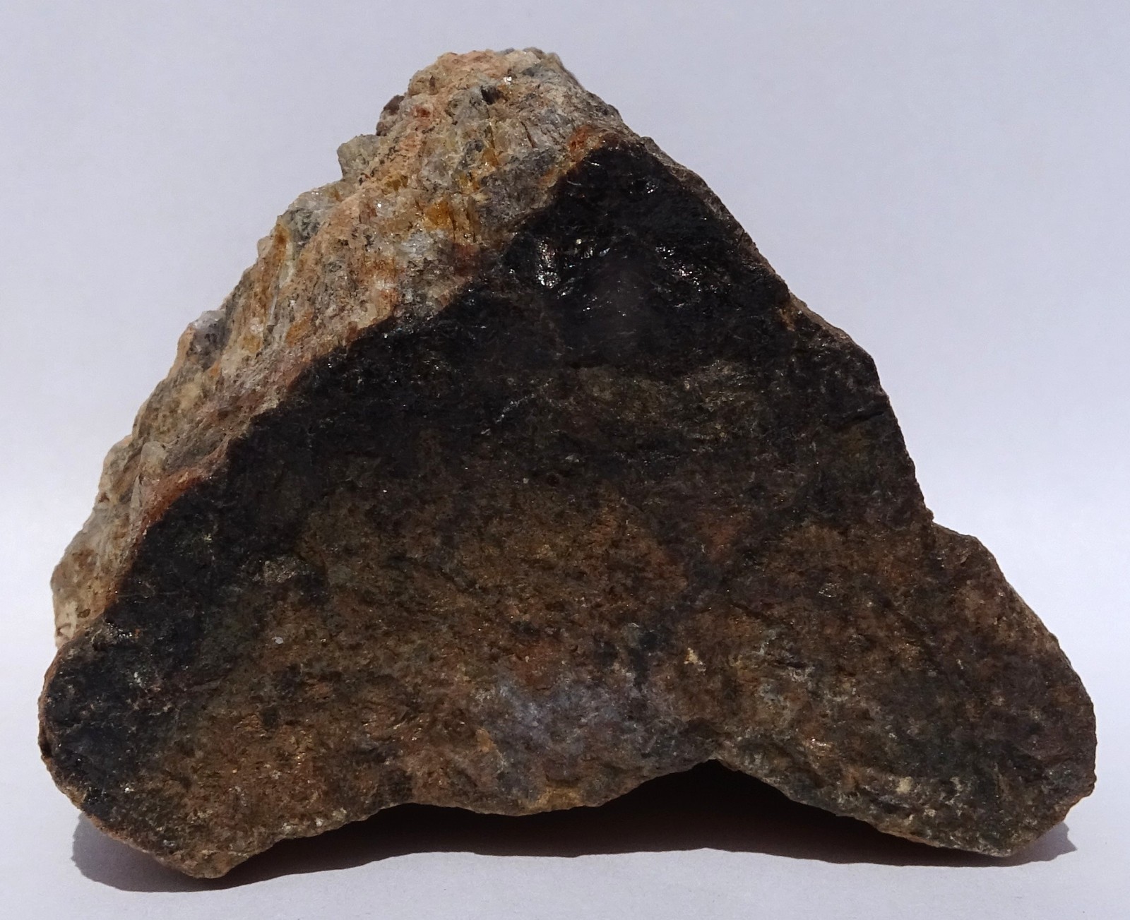 Hefty ALLANITE-(Ce)--Kingman Feldspar quarry, Arizona--Coll. by Dr Ray Grant \'93