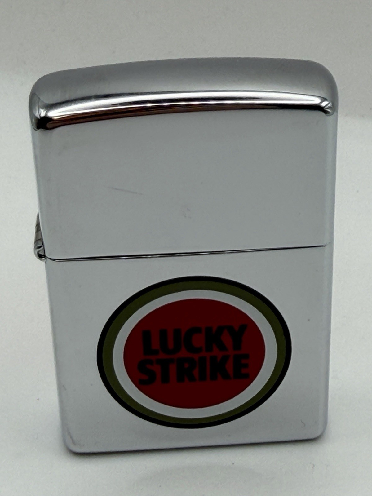 Vintage 1999 Lucky Strike Circle High Polish Chrome Zippo Lighter NEW