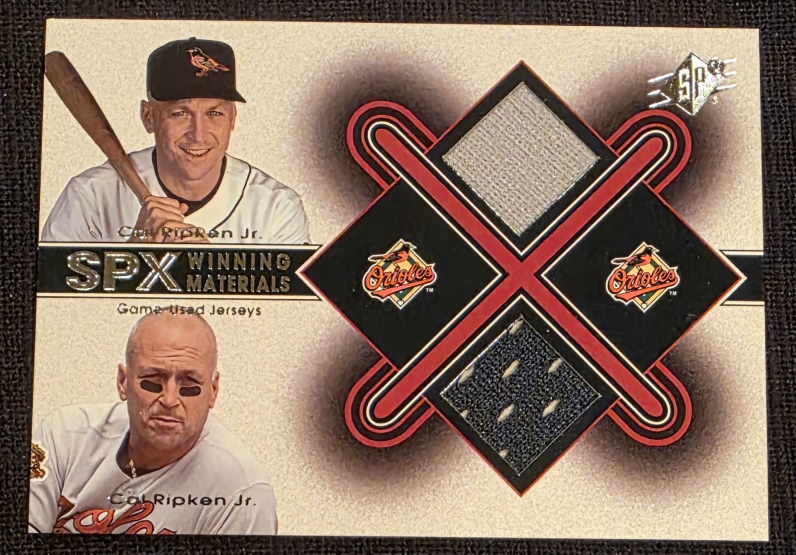 2001 SPx - Winning Materials Jersey Combo Cal Ripken #CR-X2 (MEM) Game Used 2001 SPx - Winning Materials Jersey Combo Cal Ripken #CR-X2 (MEM) Game Used