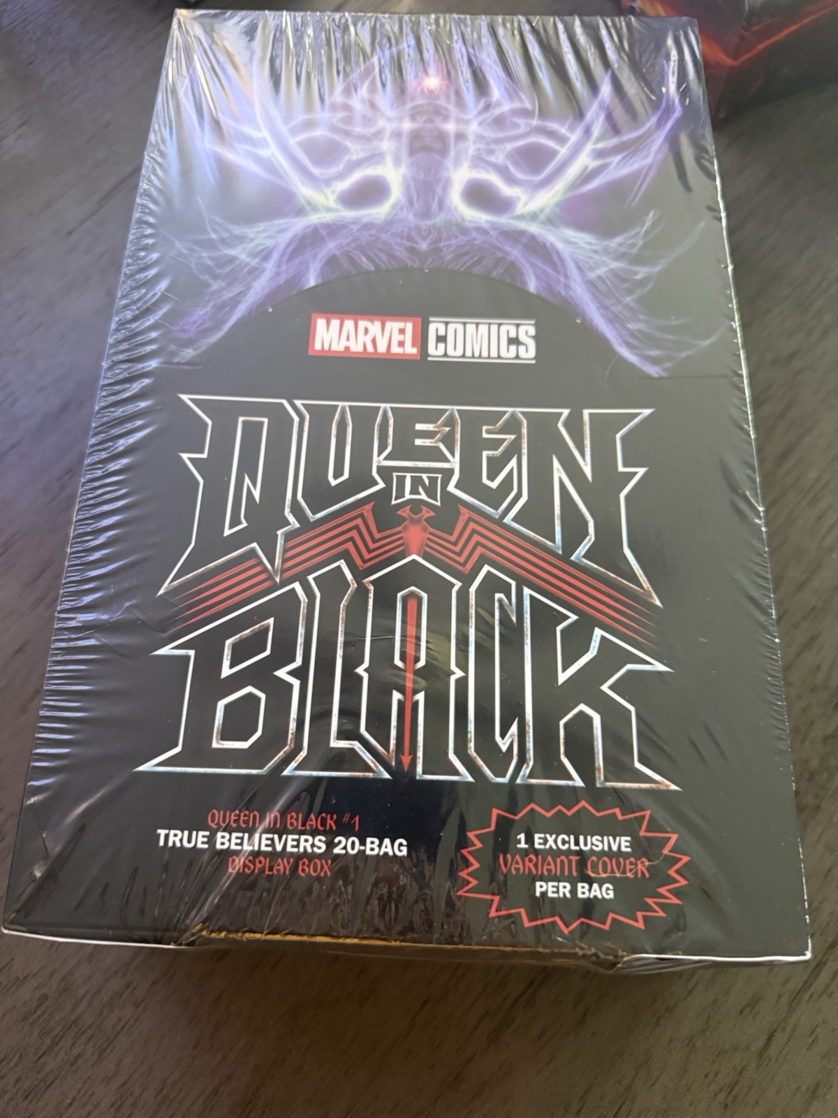 Queen In Black #1 True Believers Blind Bag 20-Bag Display Box 7/29/26 Queen In Black #1 True Believers Blind Bag 20-Bag Display Box 7/29/26