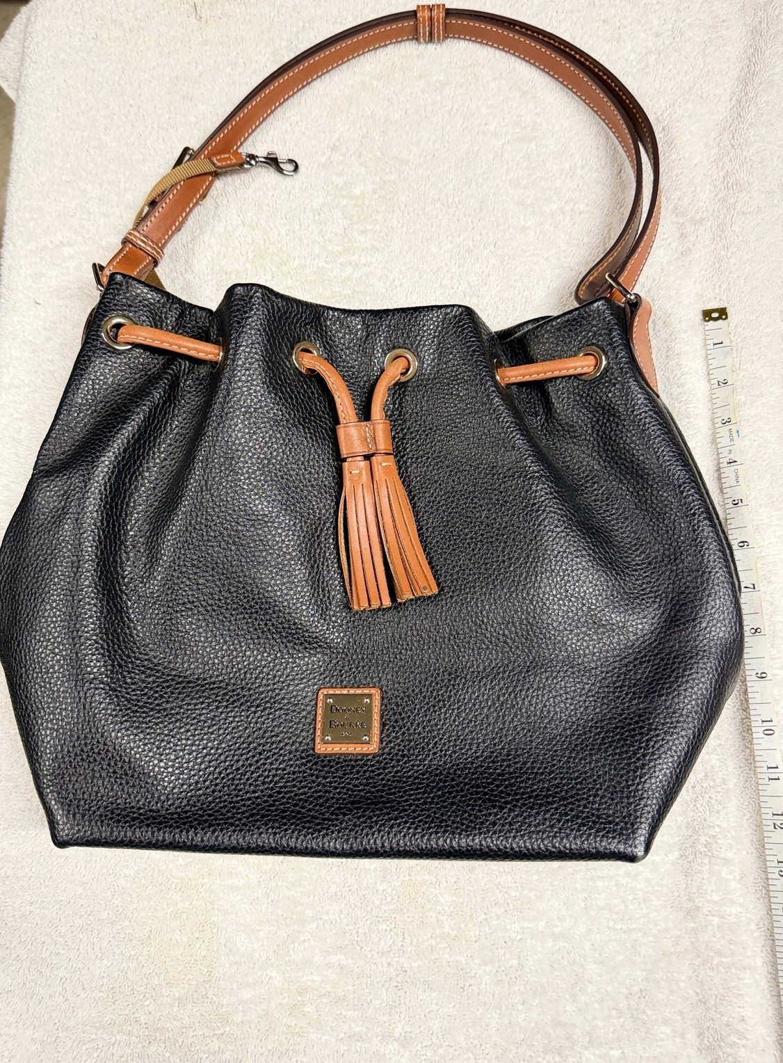 Dooney & Bourke Pebble Grain Drawstring Bucket Bag Black Tan Leather