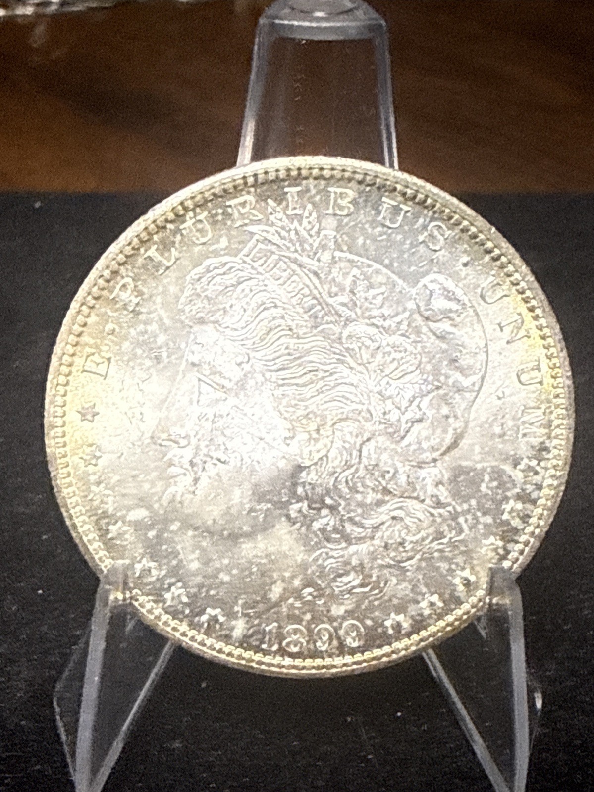 1899 O Morgan Silver $1 Dollar. Beautiful Toning 