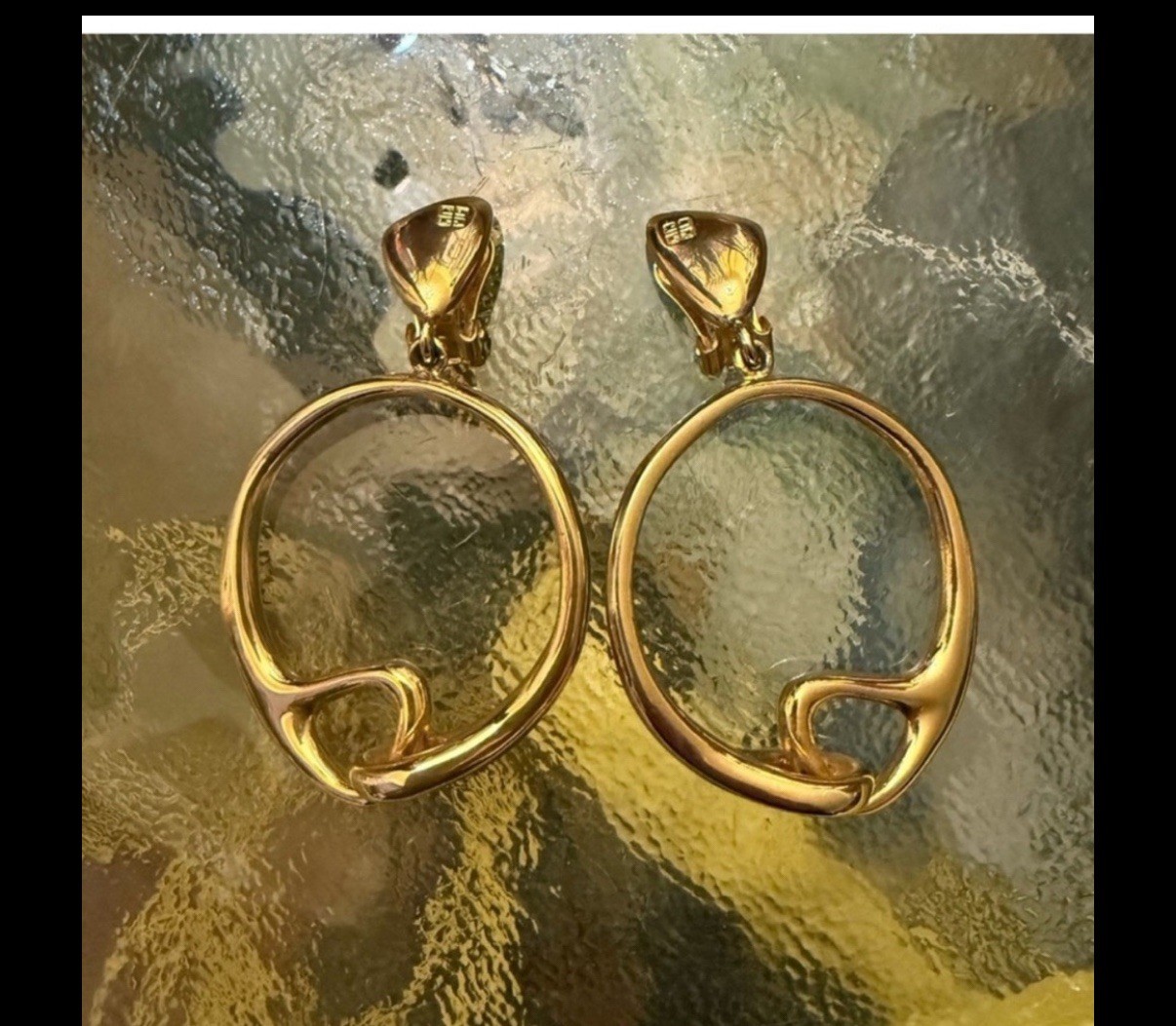 Givenchy  vintage rare clip earrings gorgeous, artistic style with a knot look