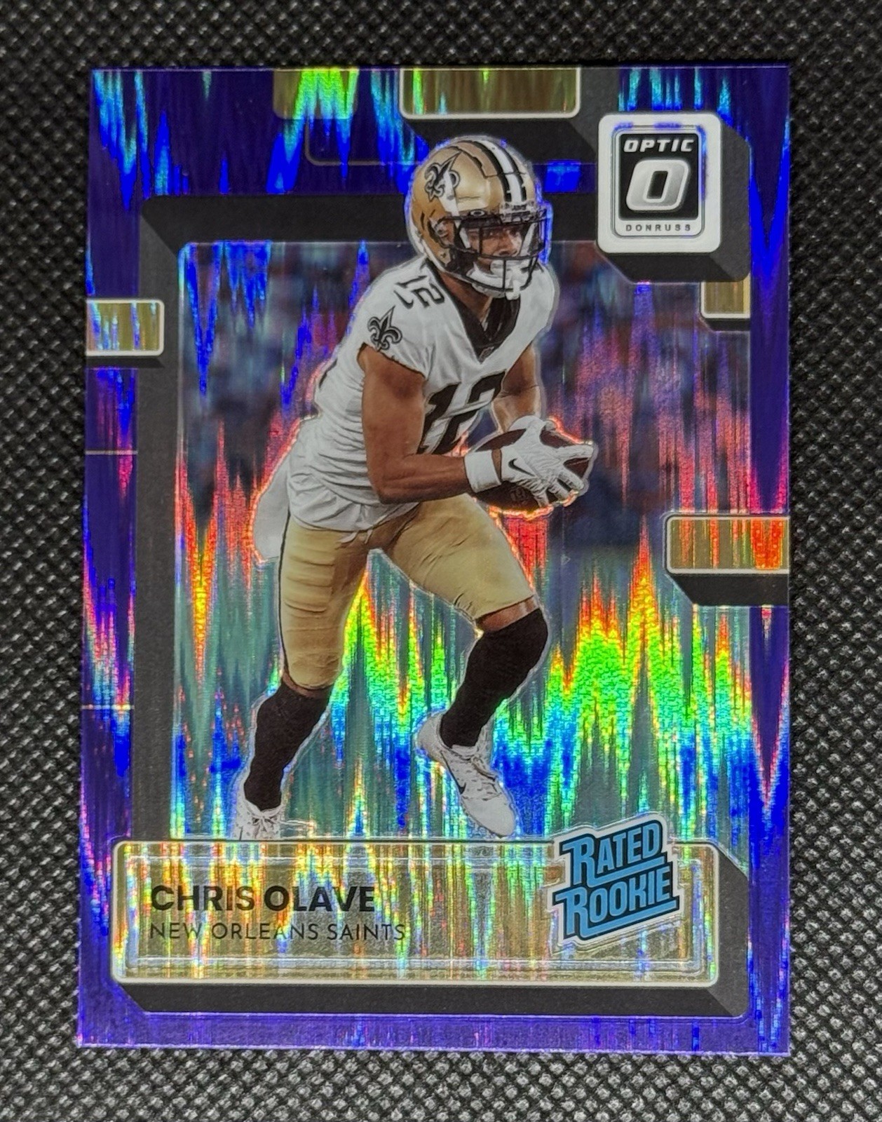 2022 Panini Donruss Optic #209 Chris Olave Rated Rookie Purple Shock RC Saints