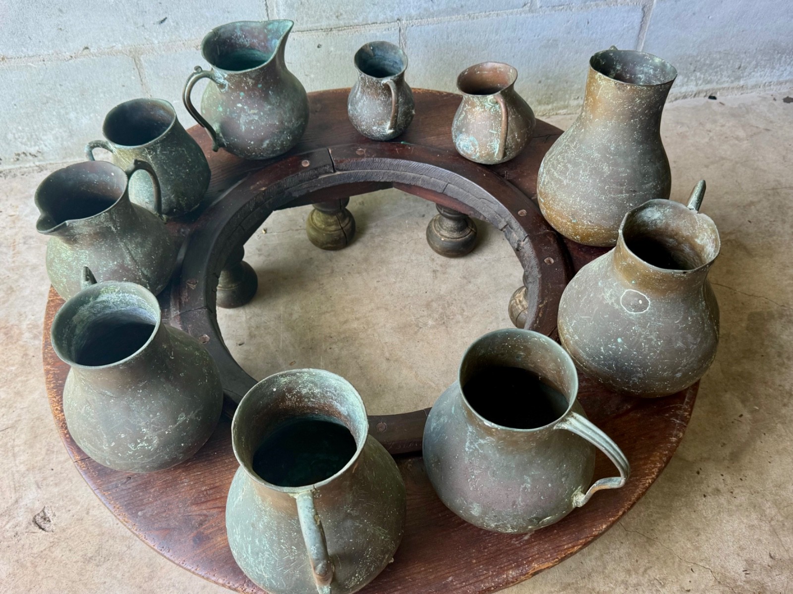 Antique Spanish Colonial set of ten brass/bronze Olletas (excluding base) Antique Spanish Colonial set of ten brass/bronze Olletas (excluding base)