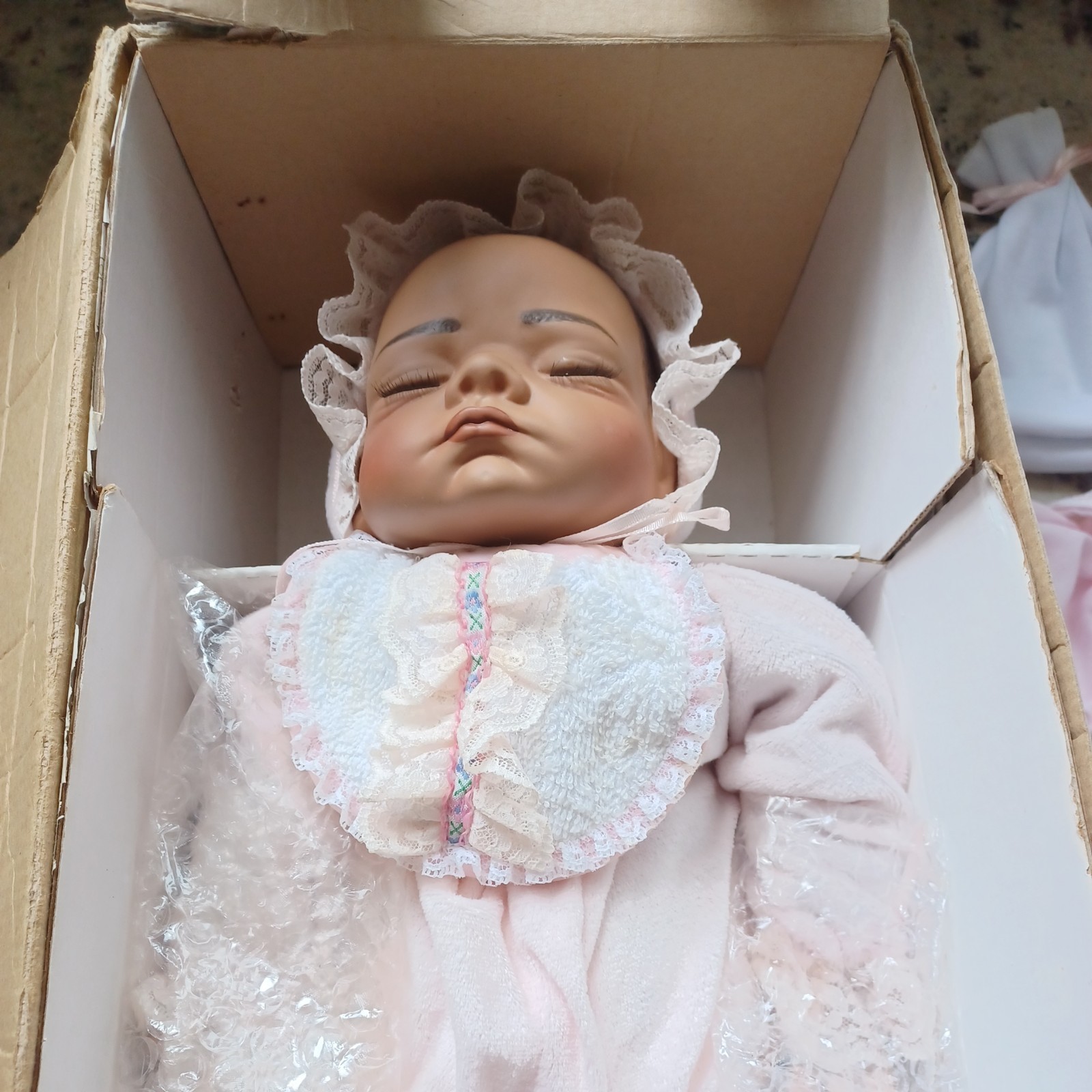 The Ashton-Drake Galleries “It\'s a Girl” used in the box  w/ Receiving Blanket