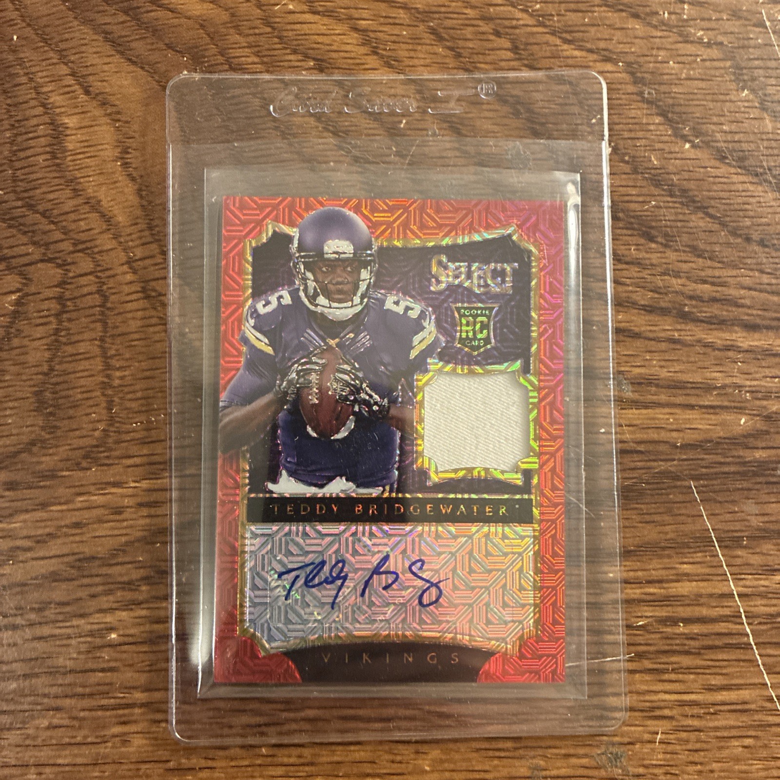 2014 Panini Select Rookie Autograph Teddy Bridgewater #22 Red /10 (AU, MEM, RC) 2014 Panini Select Rookie Autograph Teddy Bridgewater #22 Red /10 (AU, MEM, RC)