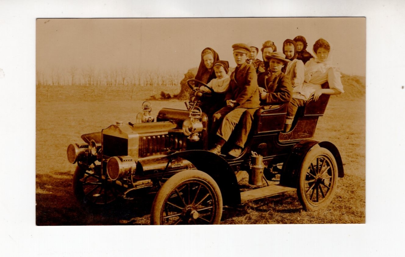 circa 1910 Real Photo Postcard / RPPC, People in an early Touring Car