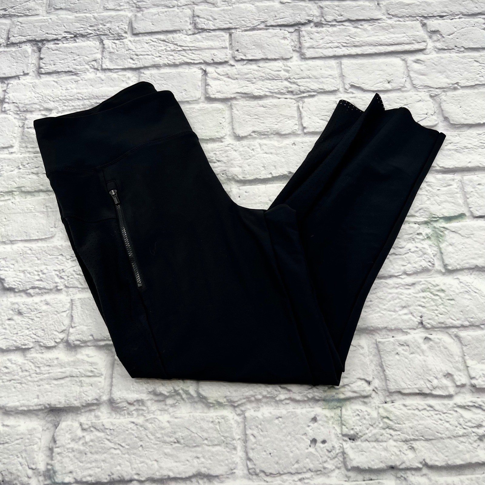Athleta Stellar Crop Pant Black Laser Cut Perforated Zipper Pockets Casual Cute