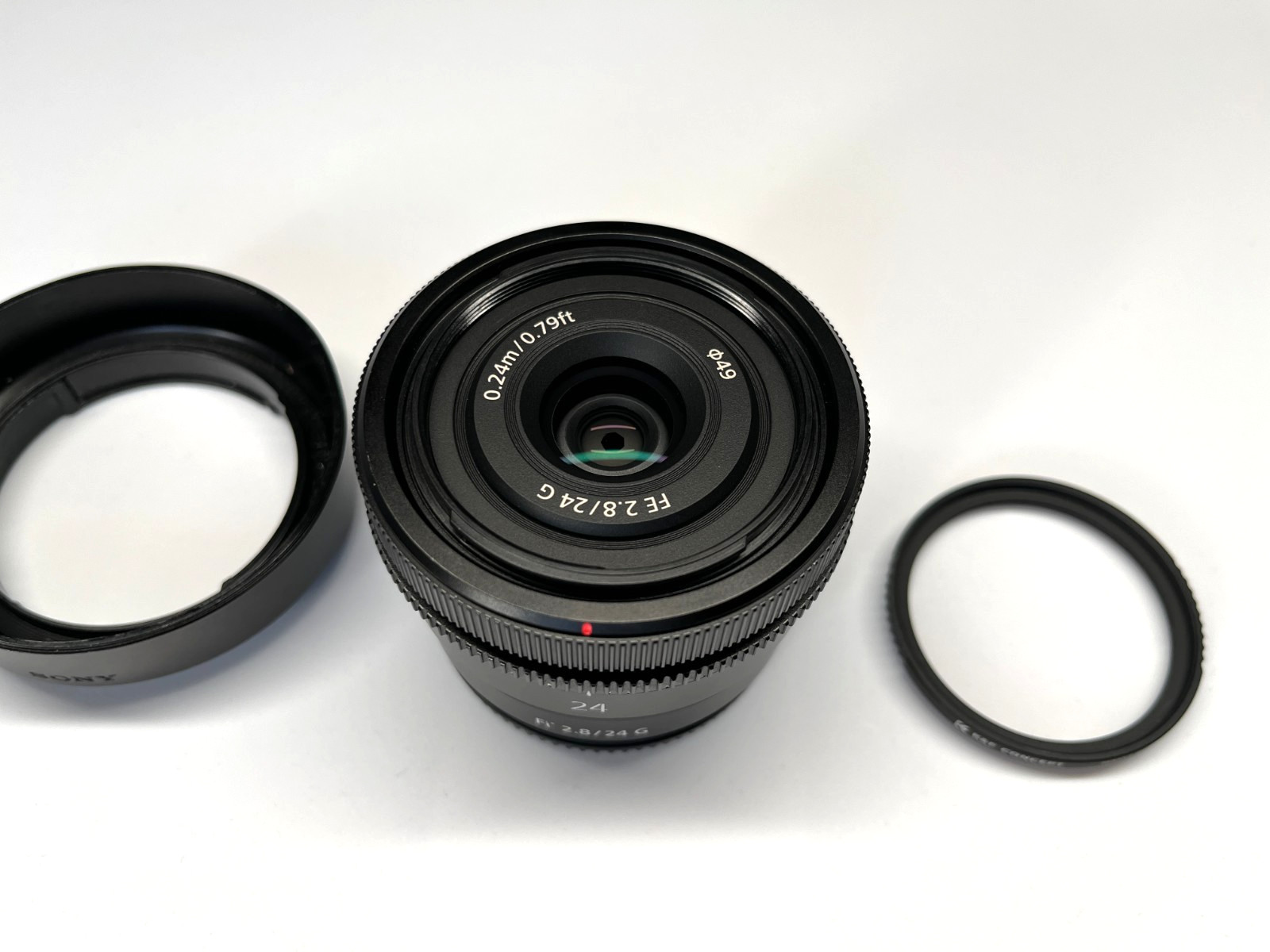 Sony FE 24mm f/2.8 G SEL24F28G Lens E-Mount + Hood, Caps & K&F UV Filter + Flash