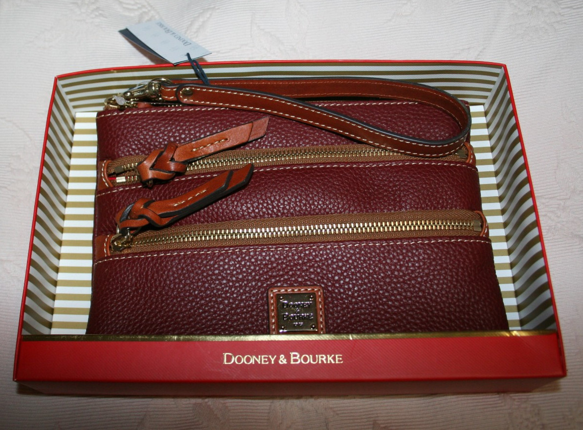 NEW in Box Dooney & Bourke Pebble Leather Grain Wine Triple Zip wristlet bag