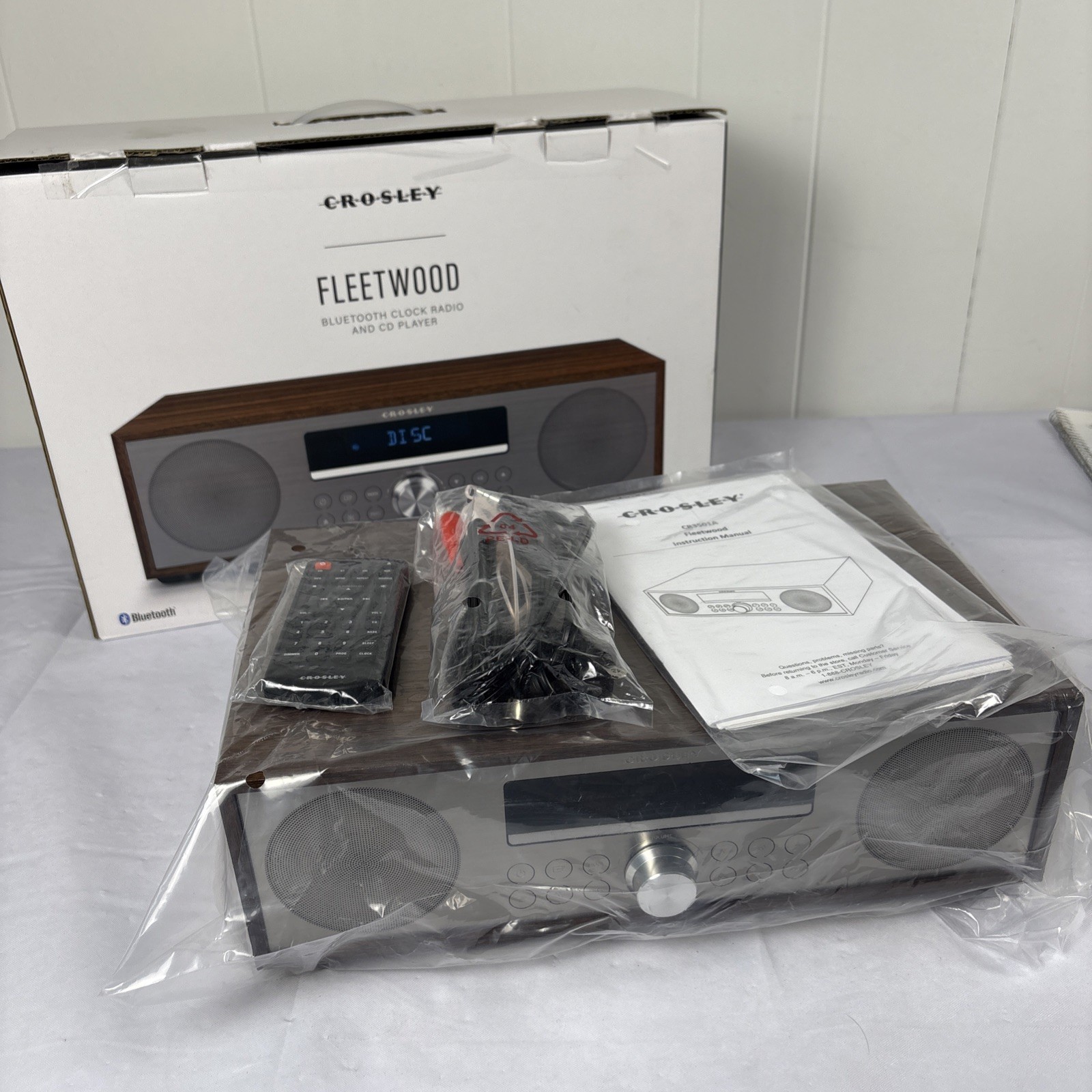 Crosley CR3501A-WA Fleetwood Bluetooth FM Clock Radio and CD Player, Walnut Crosley CR3501A-WA Fleetwood Bluetooth FM Clock Radio and CD Player, Walnut