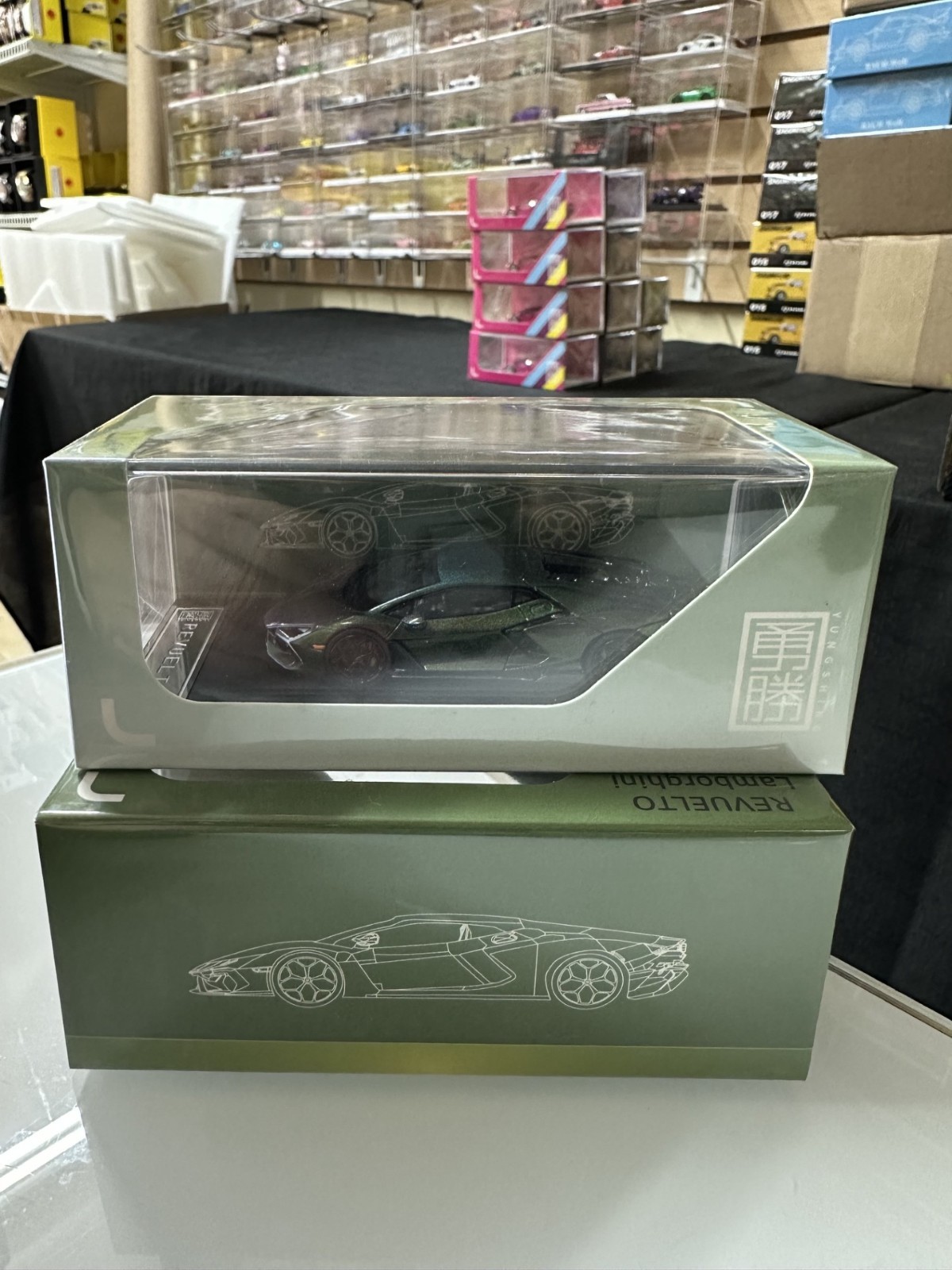LAMBORGHINI REVUELTO METALLIC GREEN CHAMELEON 1/64 DIECAST CAR BY YS MODEL LAMBORGHINI REVUELTO METALLIC GREEN CHAMELEON 1/64 DIECAST CAR BY YS MODEL