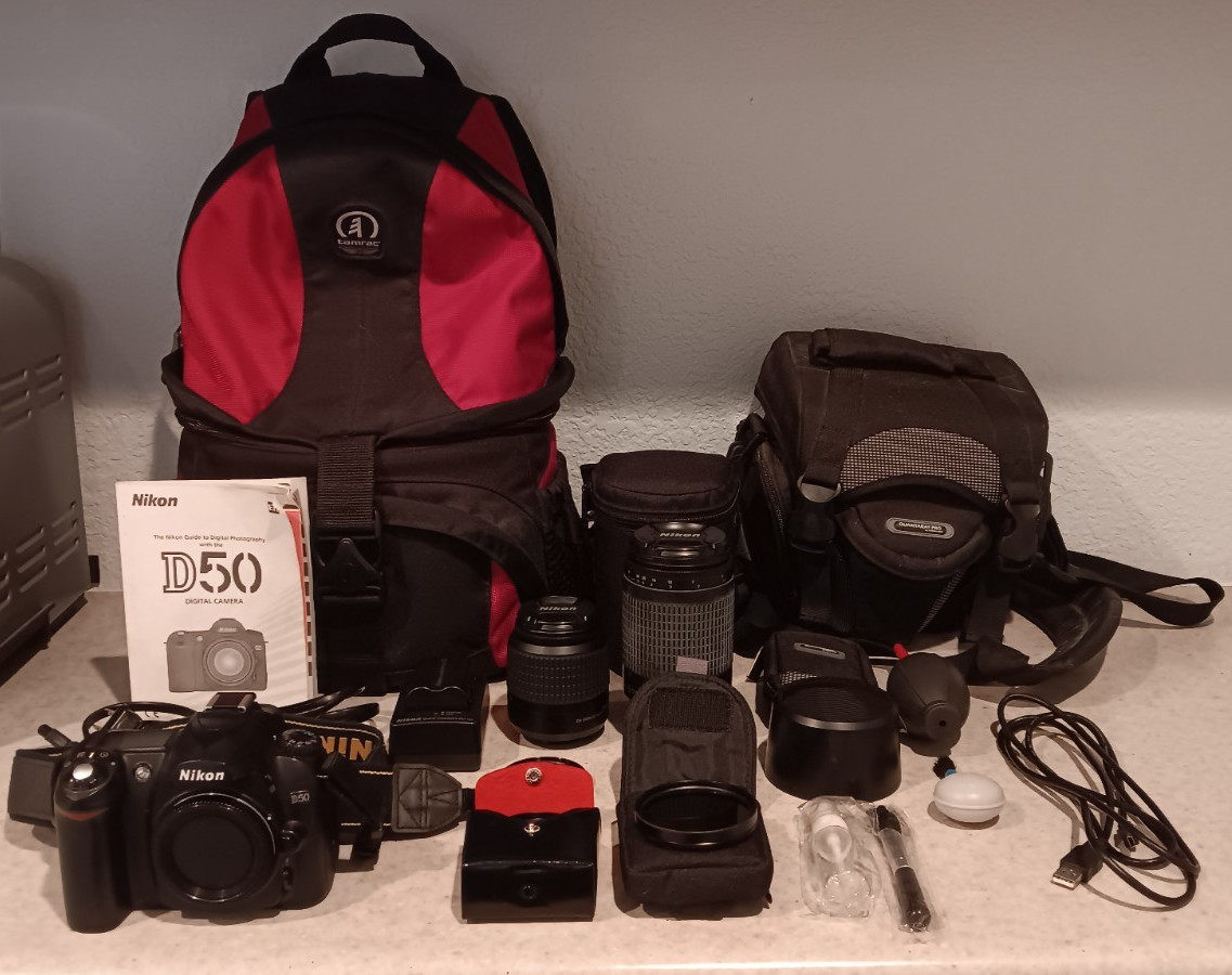 Nikon D50-6.1MP-DSLR Camera Bundle w/ 2 Travel cases, 52mm/62mm Lenses & Extras