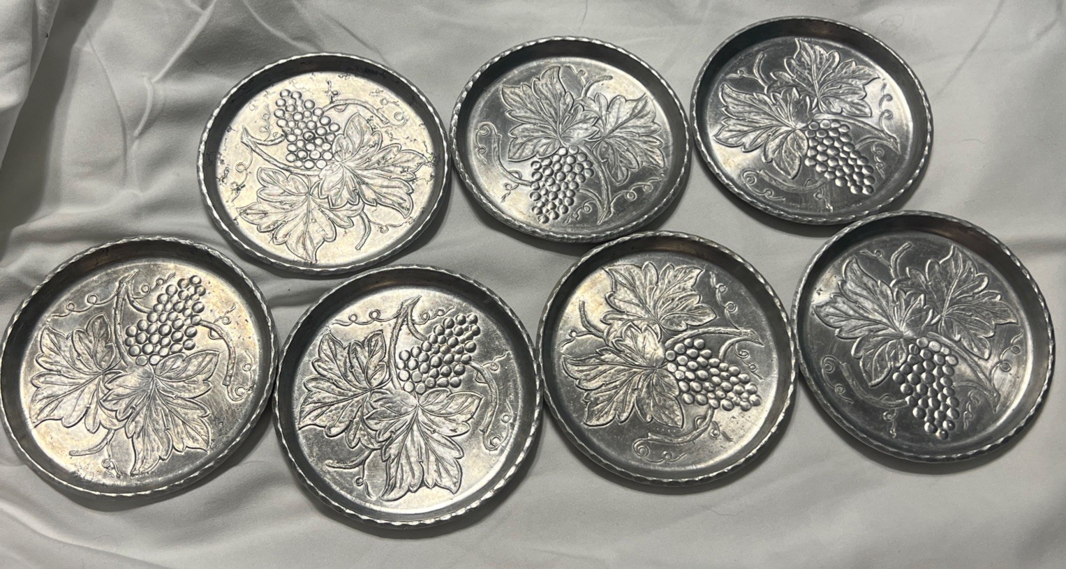 Vintage Aluminum Coasters, Set of 7, Embossed Grape Design Collectible