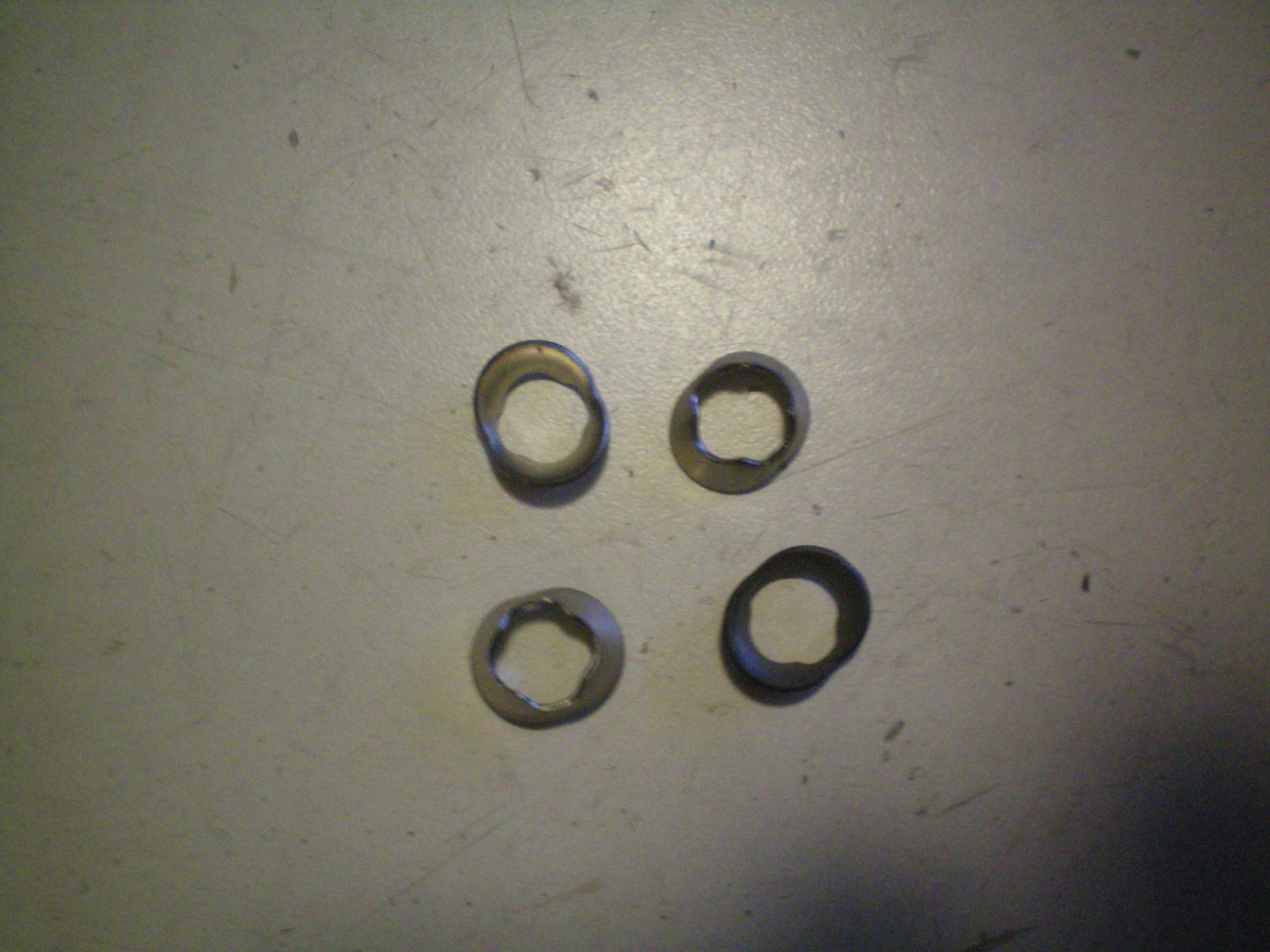 EVINRUDE/JOHNSON/OMC QUANTITY FOUR OF #302420  RETAINERS, FREE FREIGHT