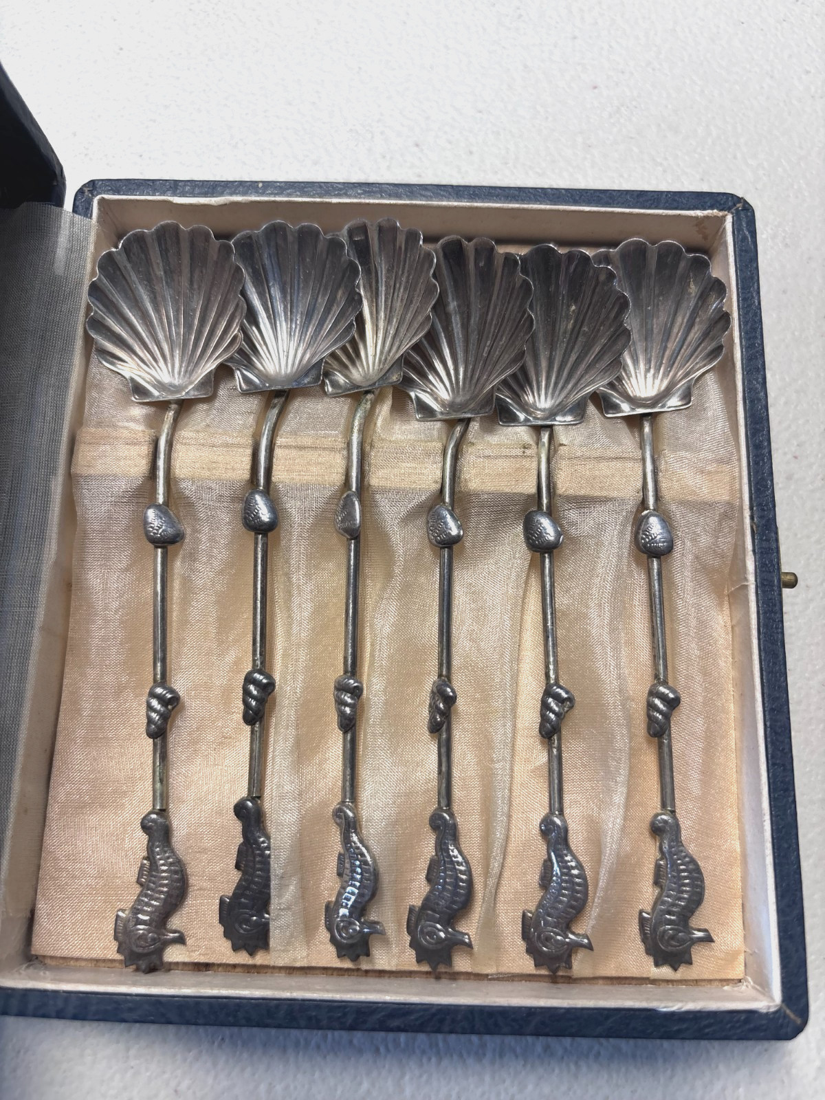 Antique set of sterling silver seahorse spoon