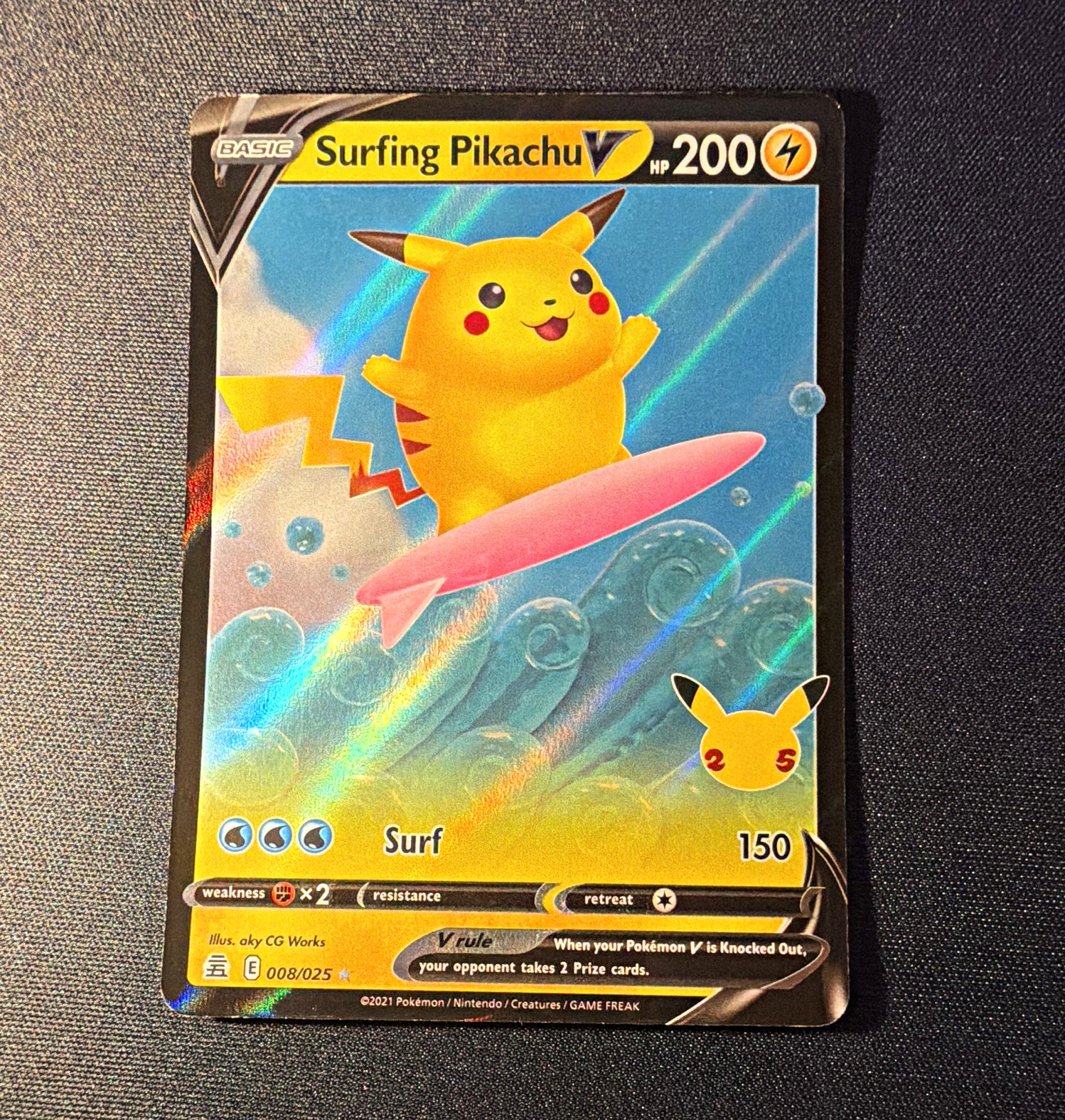 The Pokémon Company Surfing Pikachu V 008/025 Celebrations Holo Ultra Rare EN