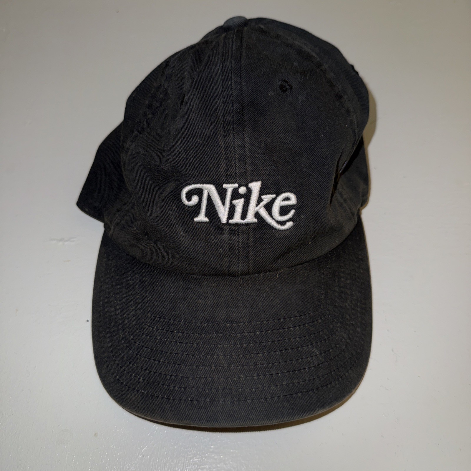 Nike Heritage86 Golf Hat Washed Black Cursive Script 1972 Leather Strap Cap
