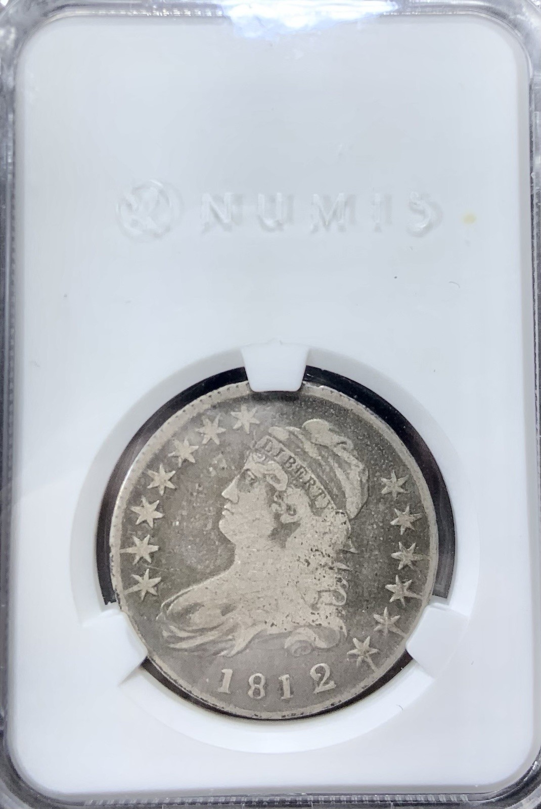 1812 Over 1 Capped Bust Silver Half Dollar