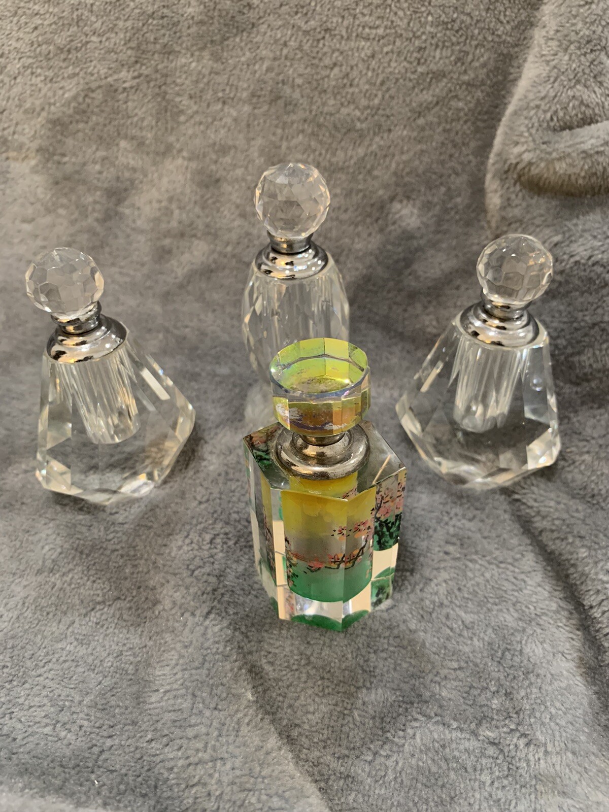 Four Vintage Crystal Perfume Bottles Clear Cut with Faceted Stoppers