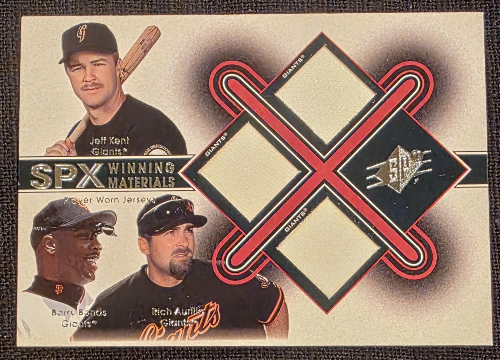 2001 SPx - Winning Materials Triple Jersey Combo Barry Bonds, Jeff Kent, Aurilia