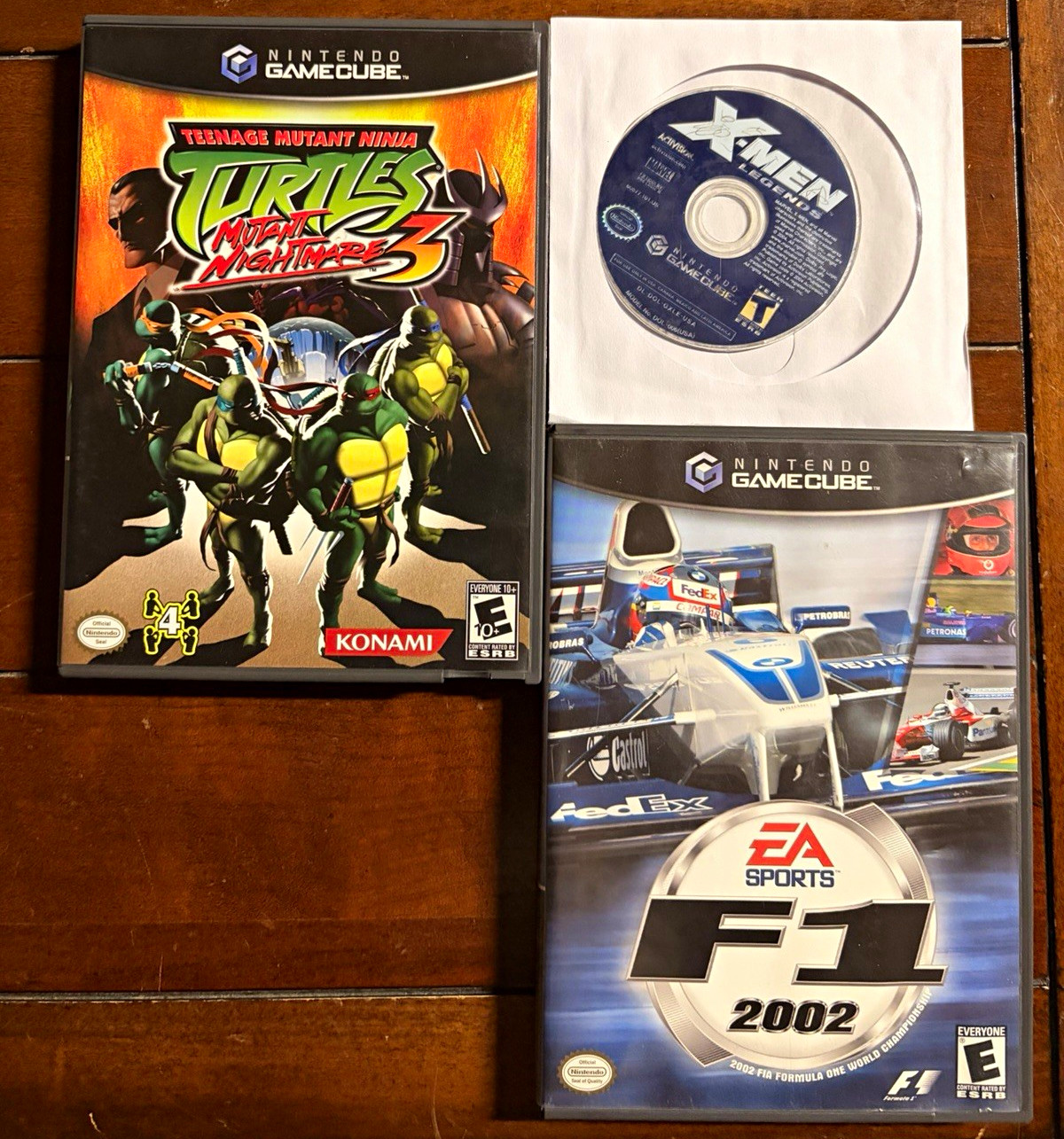GameCube TMNT Mutant Nightmares 3, X-Men Legends, F1 2002 w/ Cases+Manual lot GameCube TMNT Mutant Nightmares 3, X-Men Legends, F1 2002 w/ Cases+Manual lot