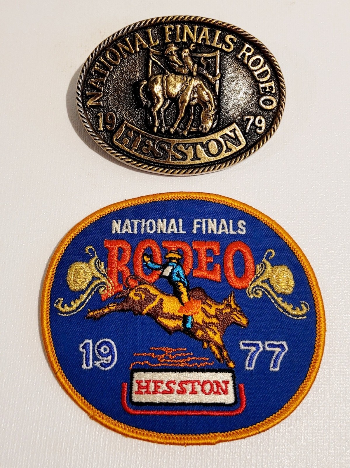 VTG HESSTON 1979 BRASS NAT\'L FINALS RODEO AND 1977 UNUSED IRON-ON PATCH