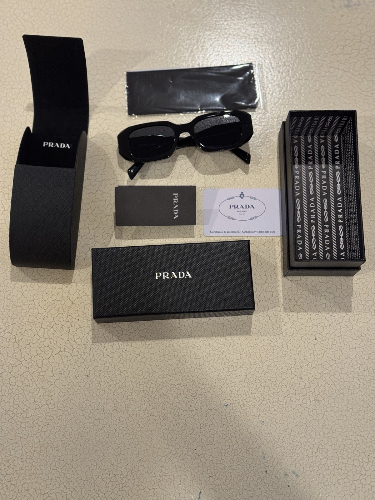 Prada PR17WS Black Frame Sunglasses with Dark Lenses – .