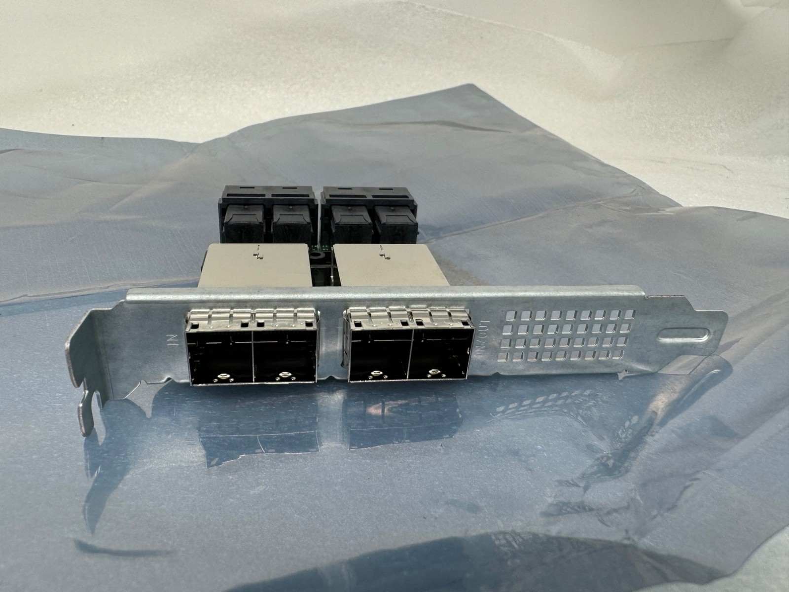 Supermicro AOM-SAS3-16I16E Internal to External Cable Adapter 16-Port MiniSAS Supermicro AOM-SAS3-16I16E Internal to External Cable Adapter 16-Port MiniSAS