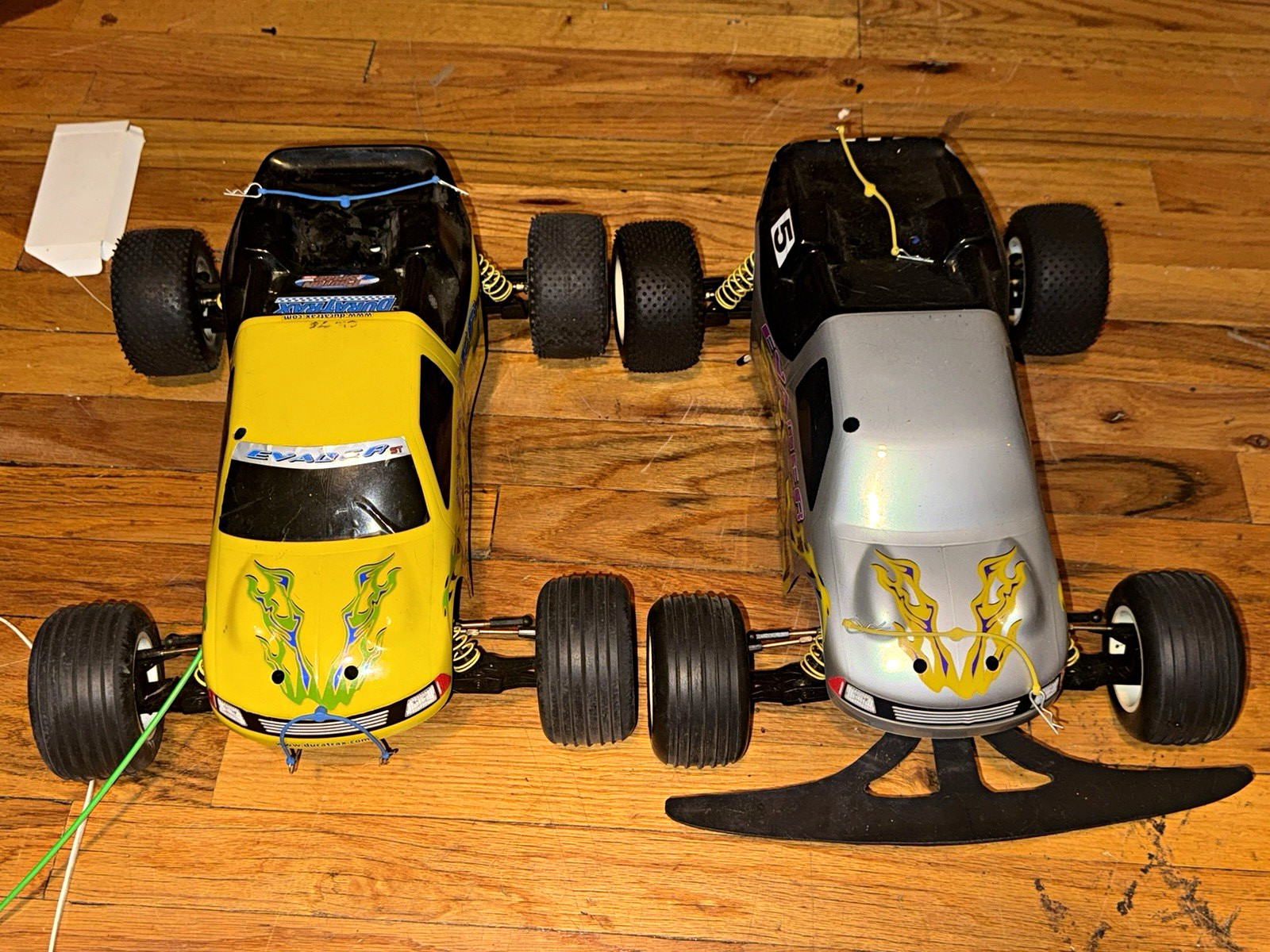 2 Duratrax Evader ST Electric RC Truck Lot 2 Bodies/Chassis Yellow Silver 2 Duratrax Evader ST Electric RC Truck Lot 2 Bodies/Chassis Yellow Silver
